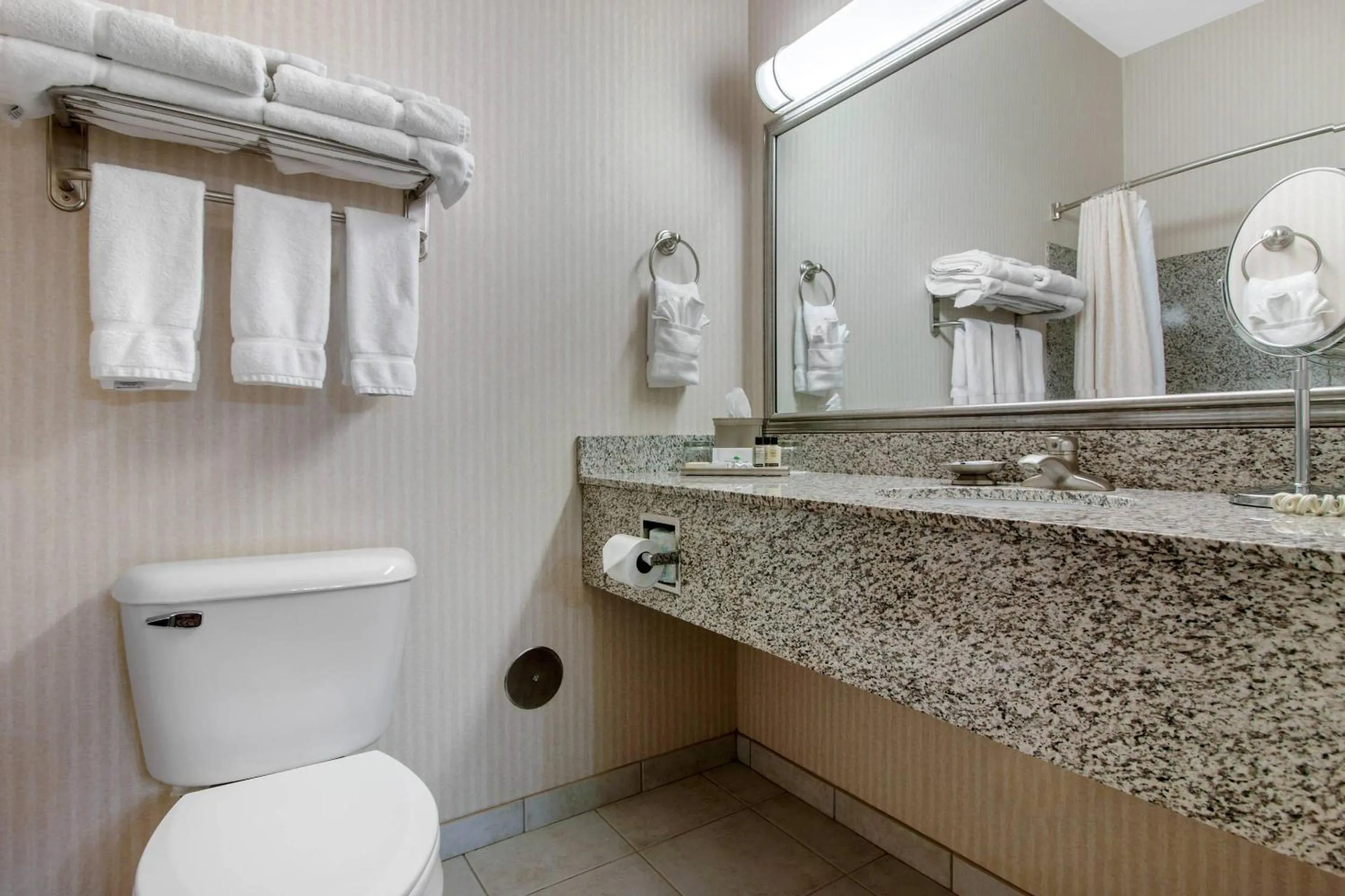 Bedroom in Norfolk Lodge & Suites, an Ascend Collection Hotel