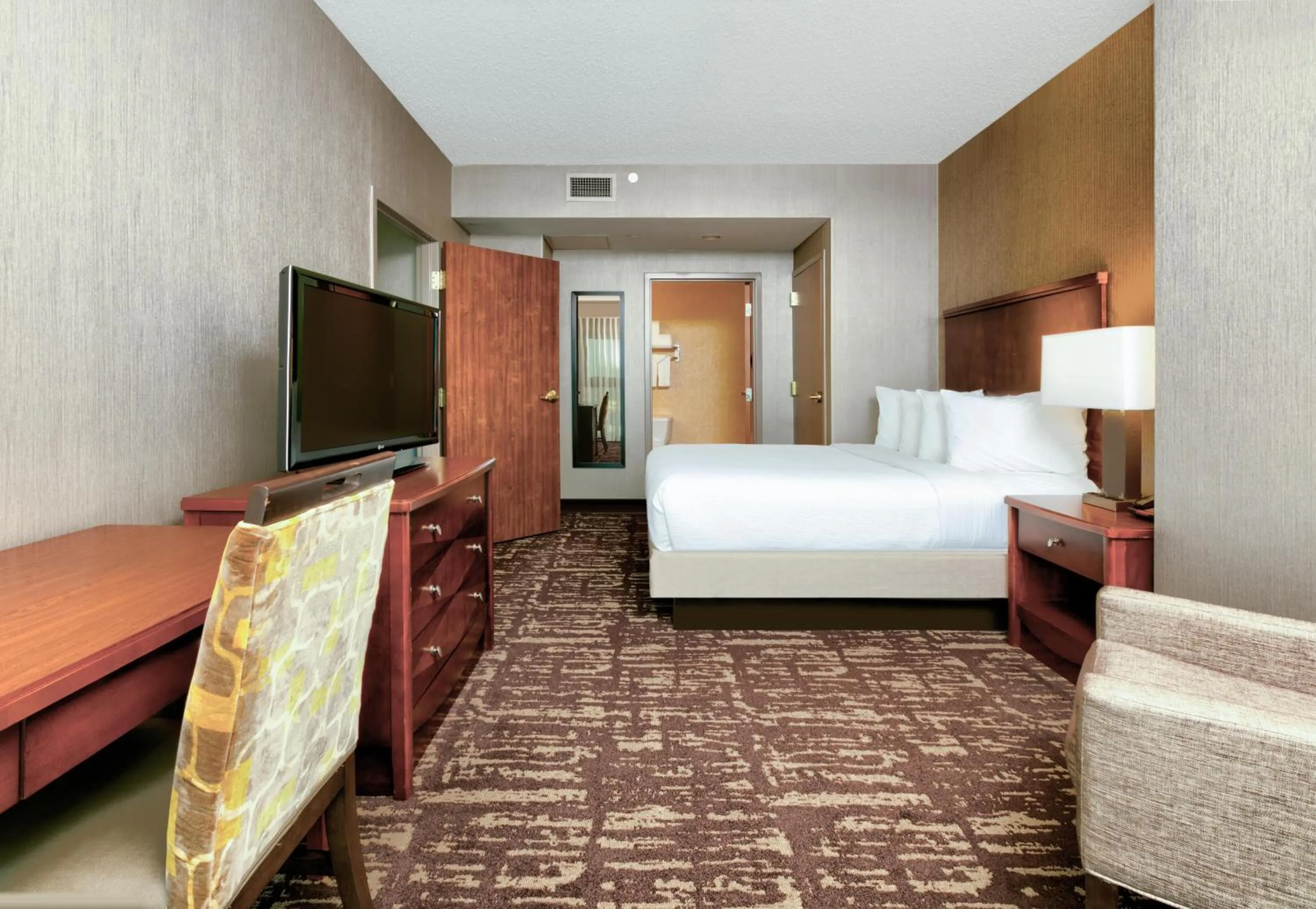 Bed in Embassy Suites by Hilton Dallas Frisco Hotel & Convention Center