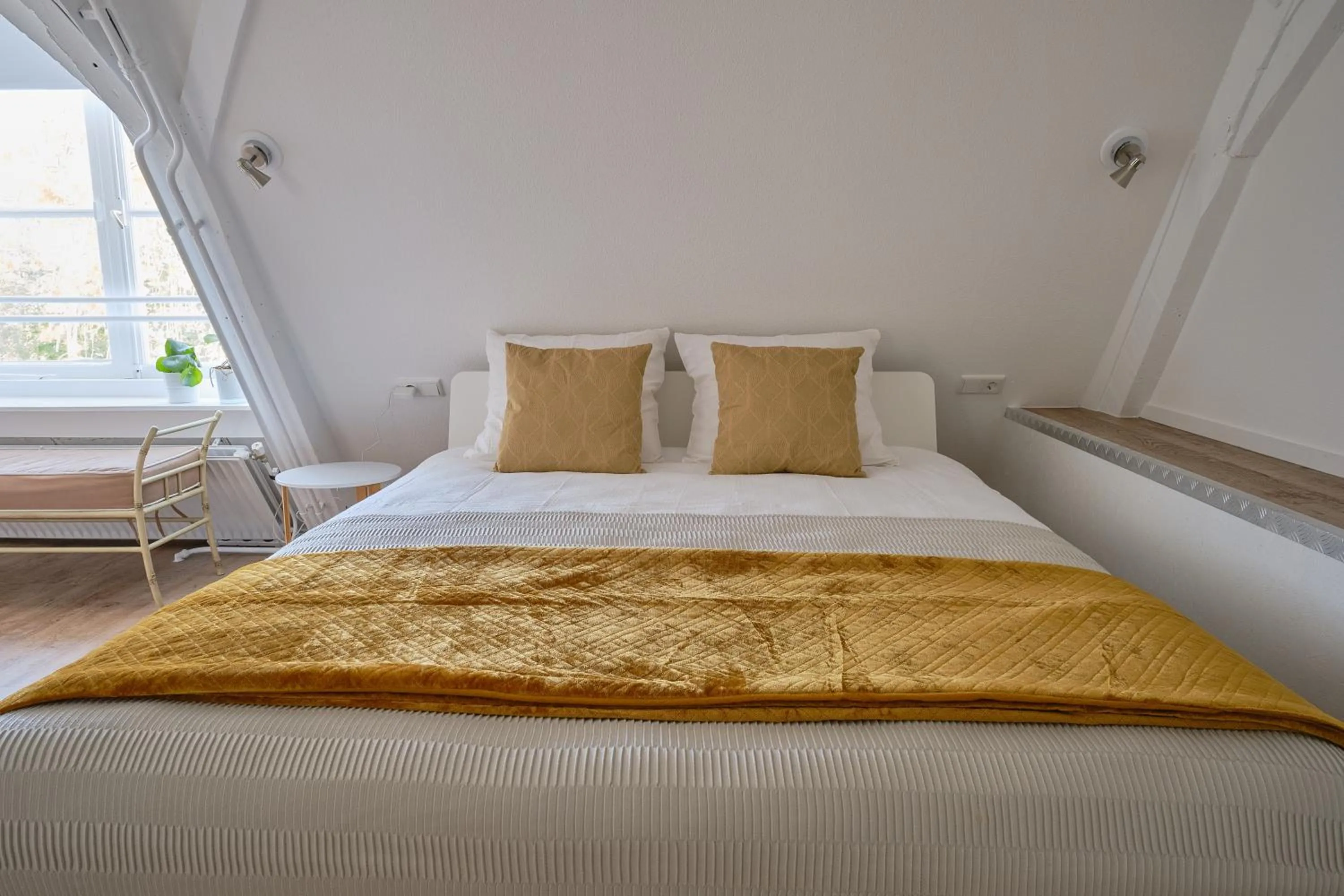 Bed in Het Gecroonde Swaert B&B