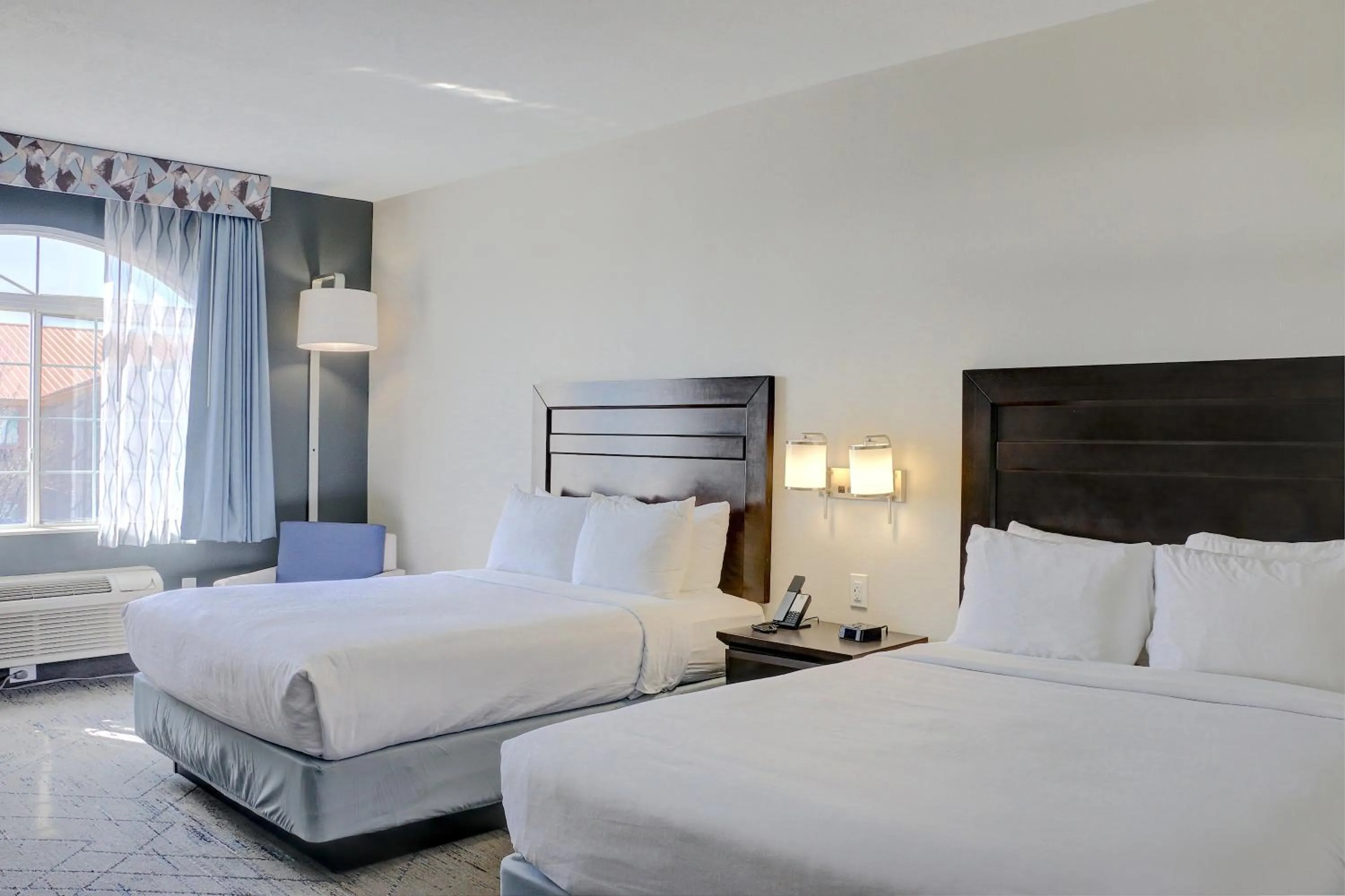 Bed in Quality Inn & Suites Roswell North