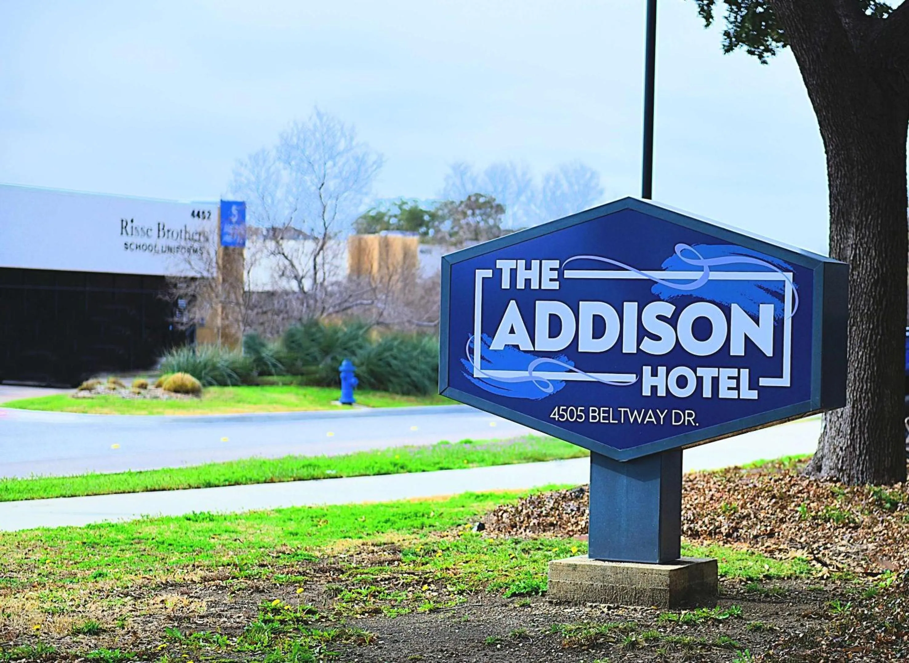 Property building in The Addison Hotel SureStay Collection by Best Western