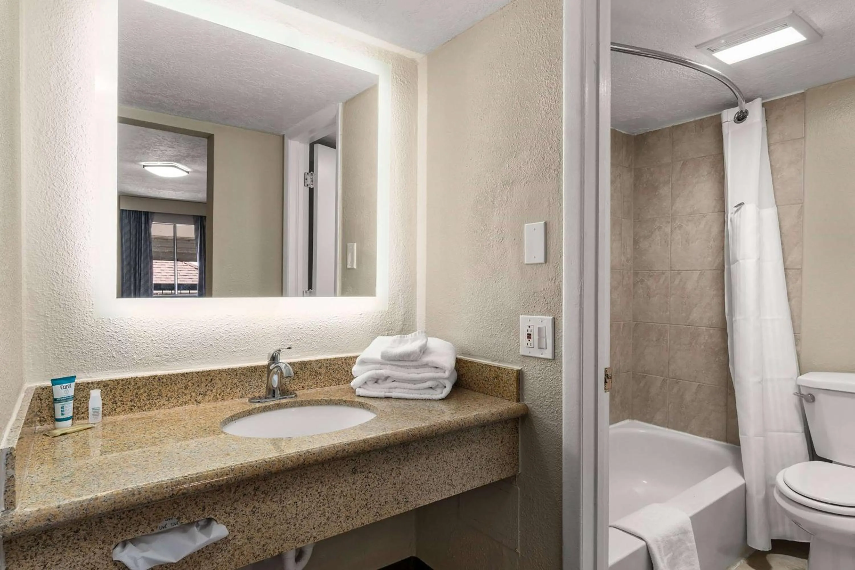 Bathroom in Days inn by Wyndham Albuquerque Northeast