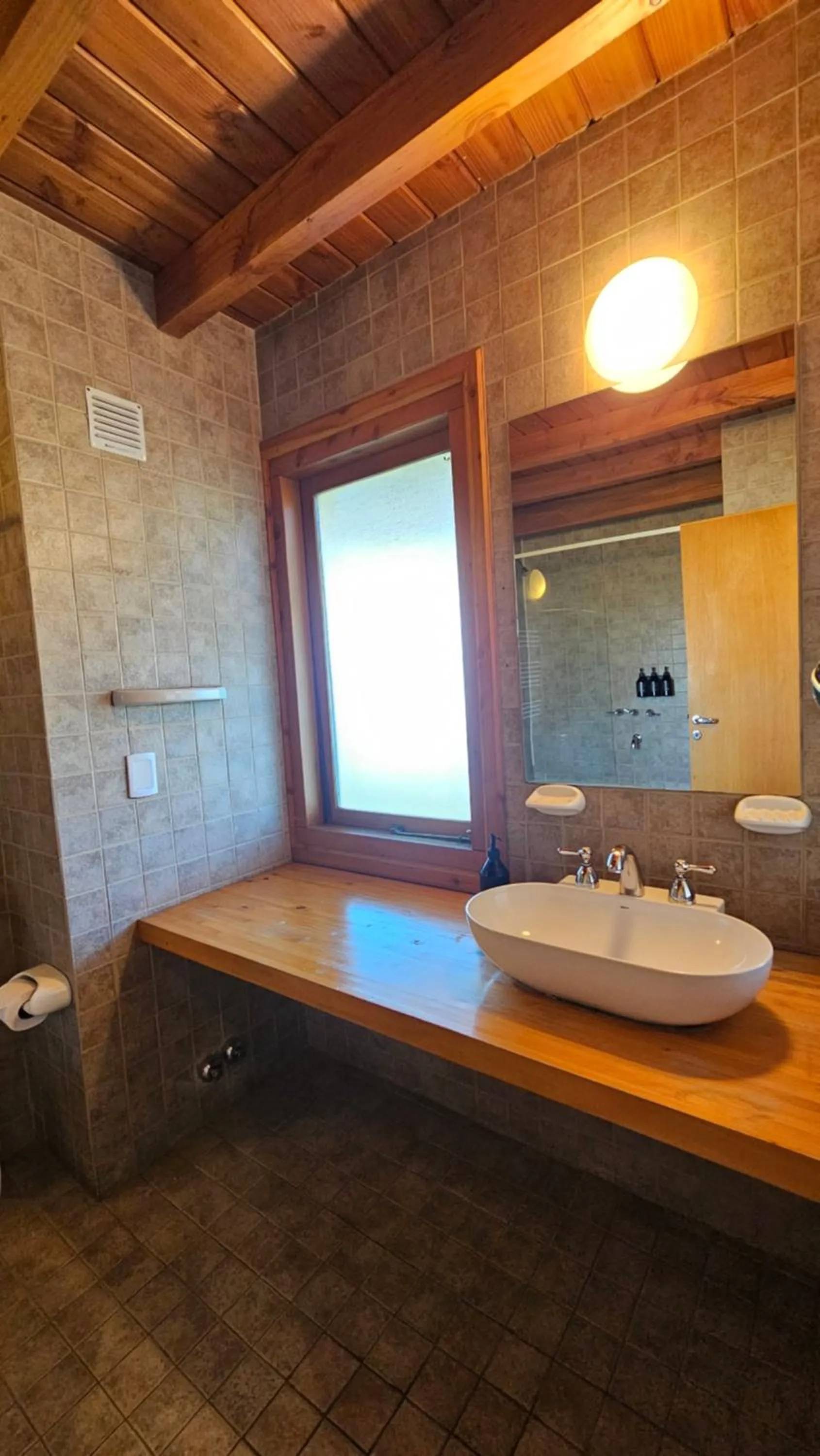Bathroom in Pioneros Suites by Grupo Tierra Gaucha