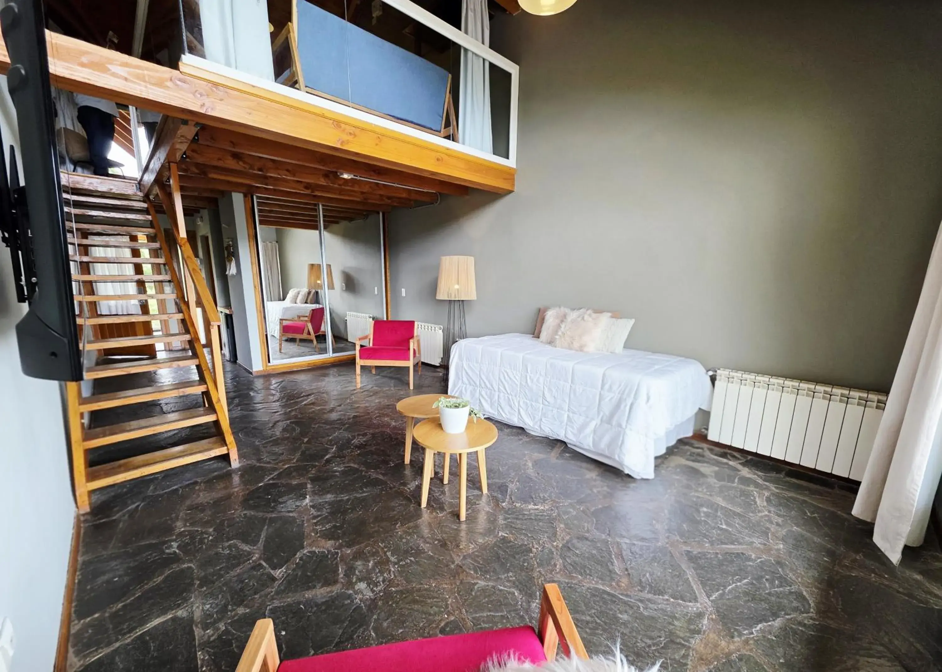 Family Room in Pioneros Suites by Grupo Tierra Gaucha Family Room in Pioneros Suites by Grupo Tierra Gaucha