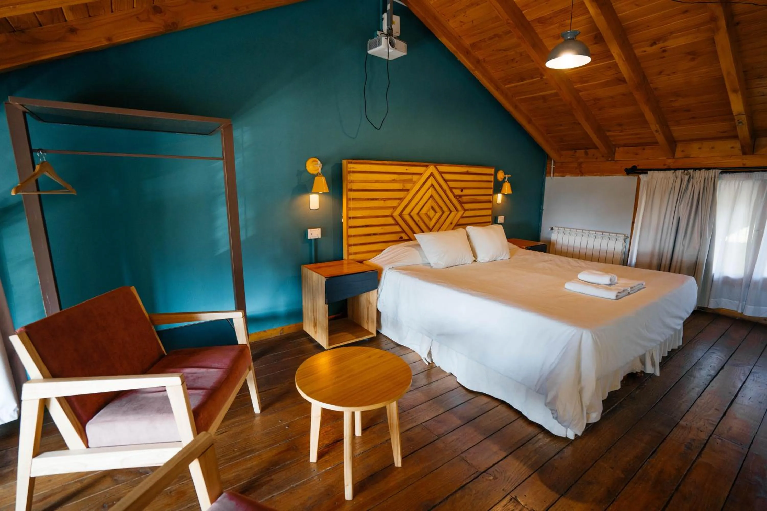 Bedroom, Bed in Pioneros Suites by Grupo Tierra Gaucha