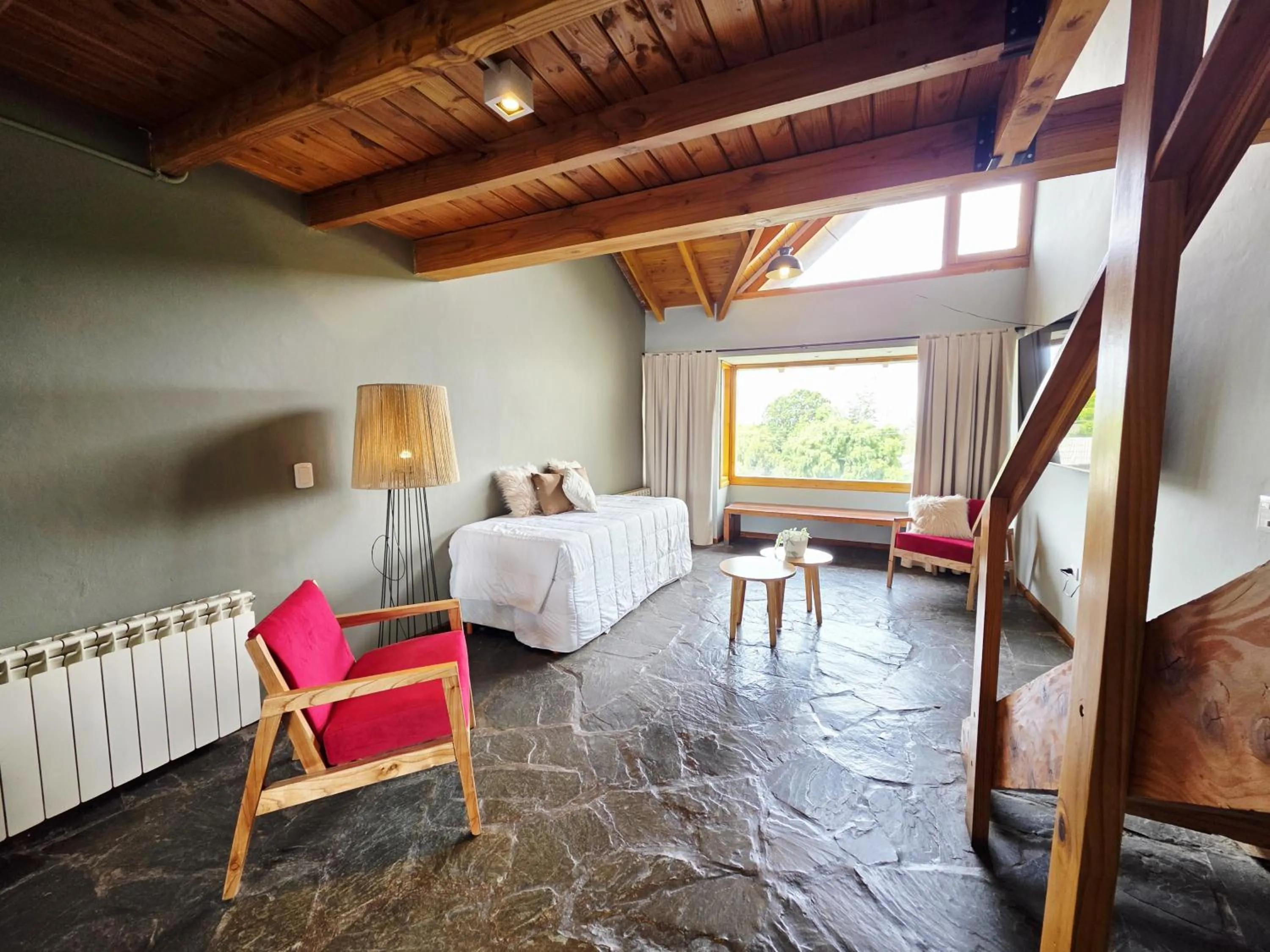 Bed in Pioneros Suites by Grupo Tierra Gaucha