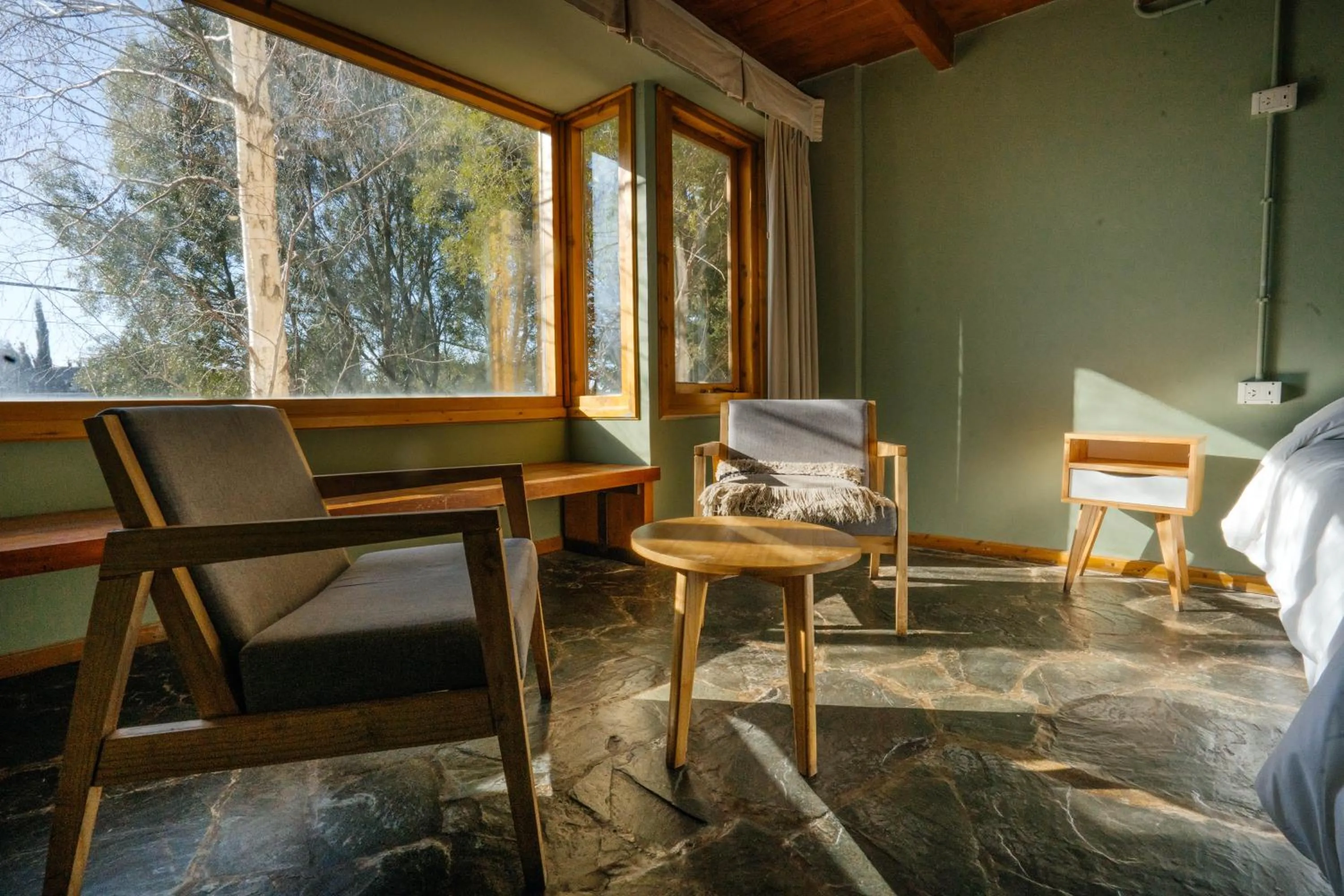 Living room in Pioneros Suites by Grupo Tierra Gaucha