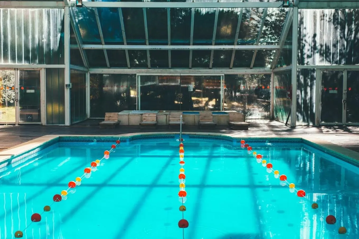 Swimming pool in Pioneros Suites by Grupo Tierra Gaucha