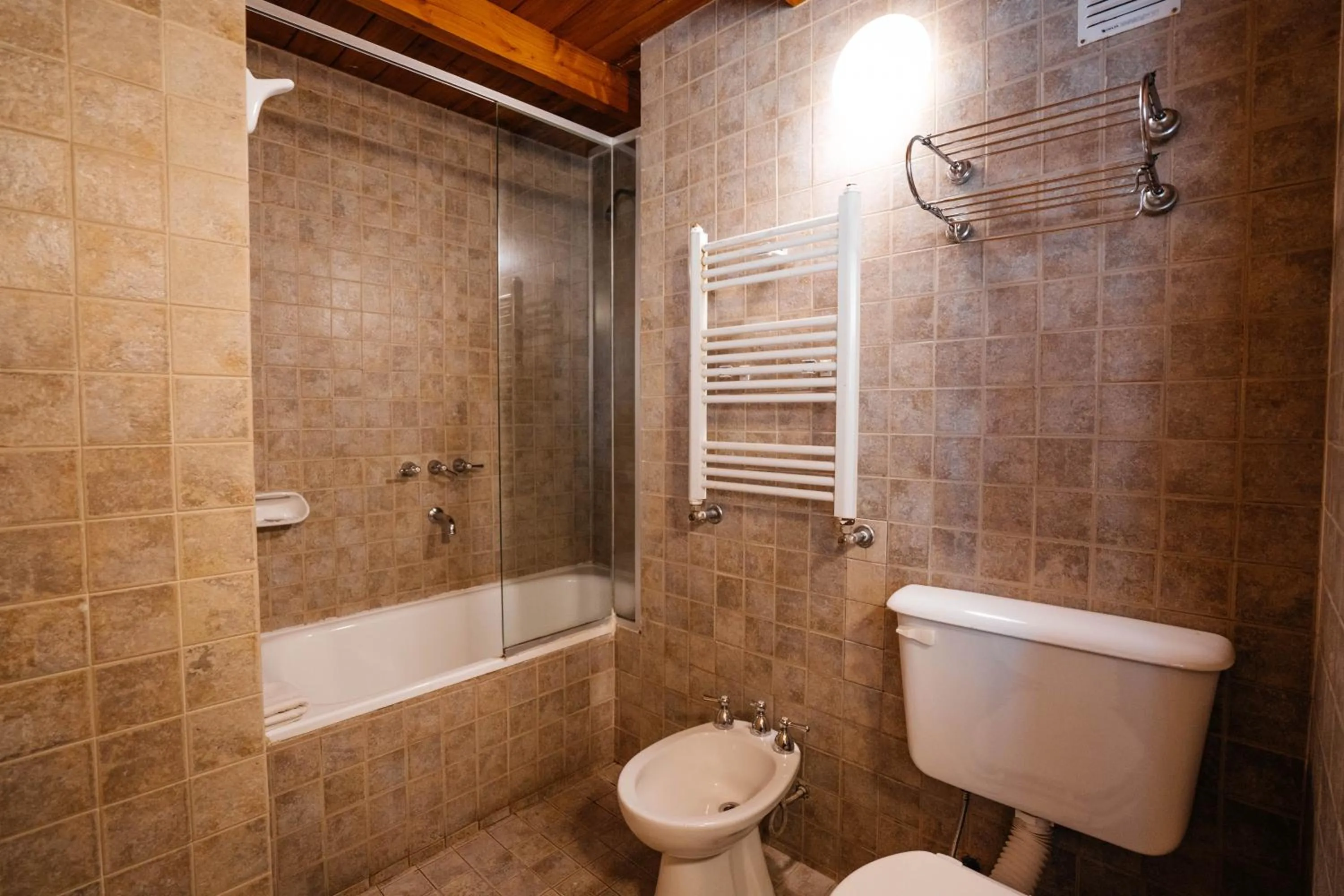 Bathroom in Pioneros Suites by Grupo Tierra Gaucha
