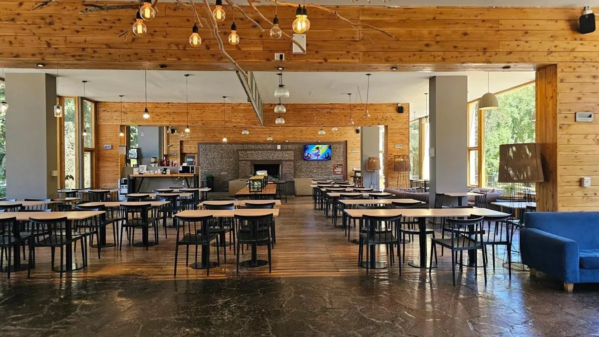 Lobby or reception in Pioneros Suites by Grupo Tierra Gaucha