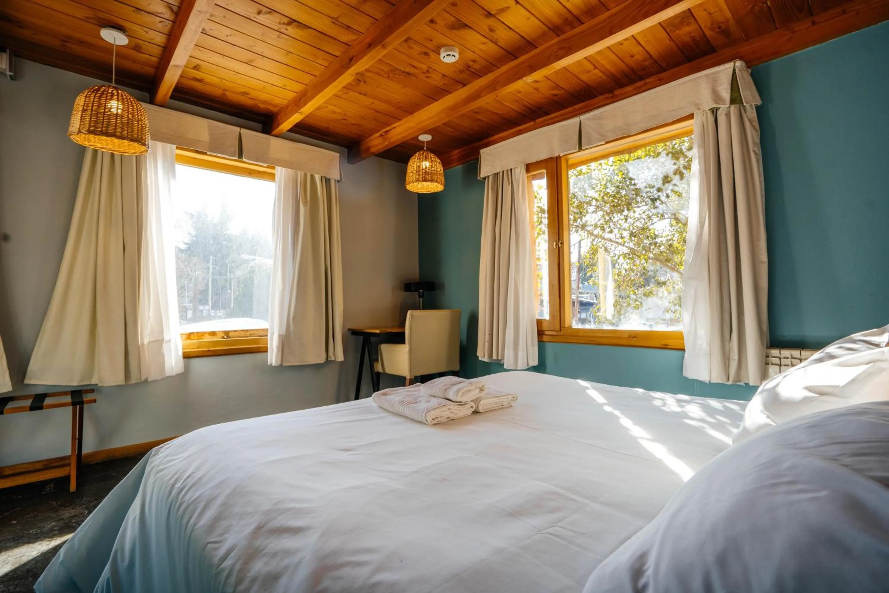 Bed in Pioneros Suites by Grupo Tierra Gaucha