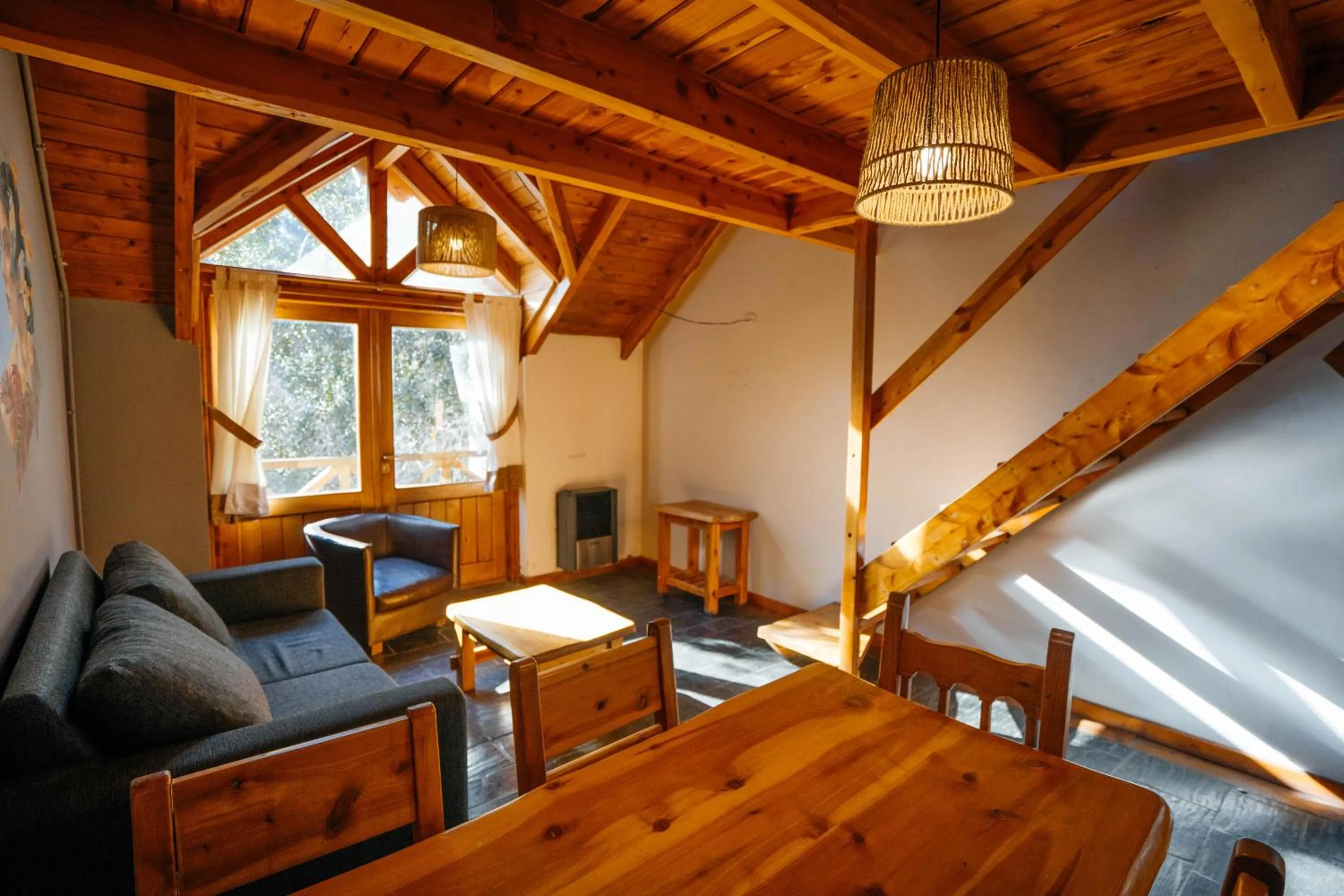 Living room in Pioneros Suites by Grupo Tierra Gaucha