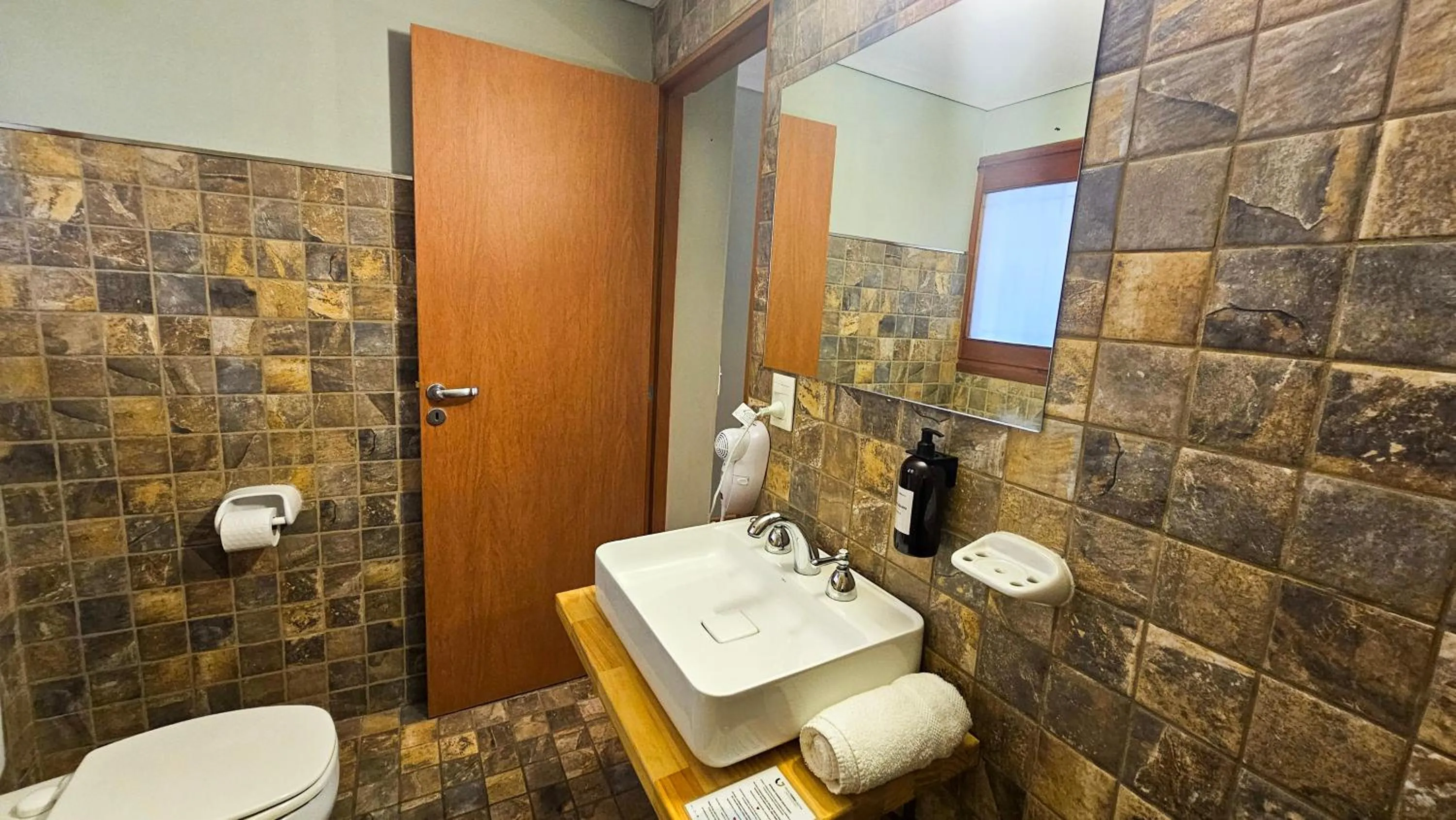 Bathroom in Pioneros Suites by Grupo Tierra Gaucha