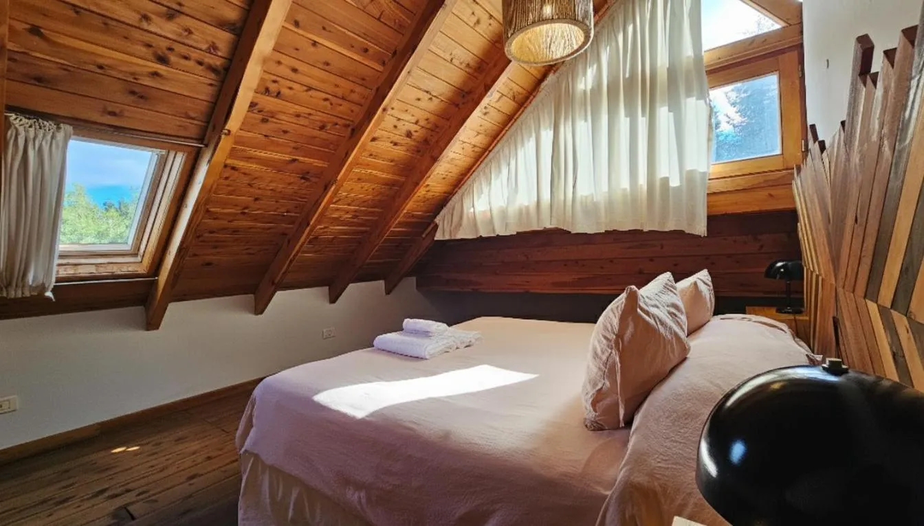 Bedroom, Bed in Pioneros Suites by Grupo Tierra Gaucha