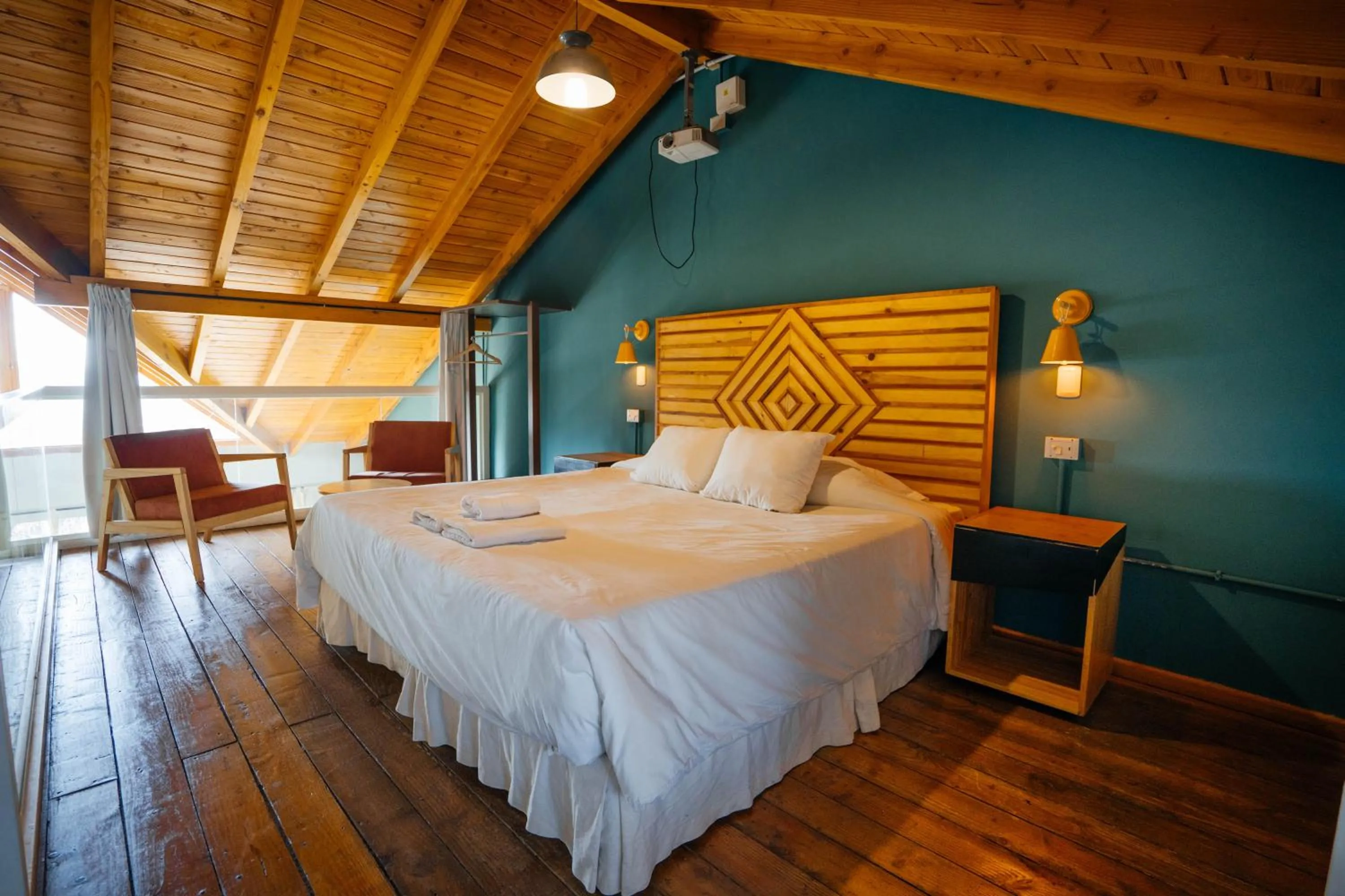 Bedroom, Bed in Pioneros Suites by Grupo Tierra Gaucha