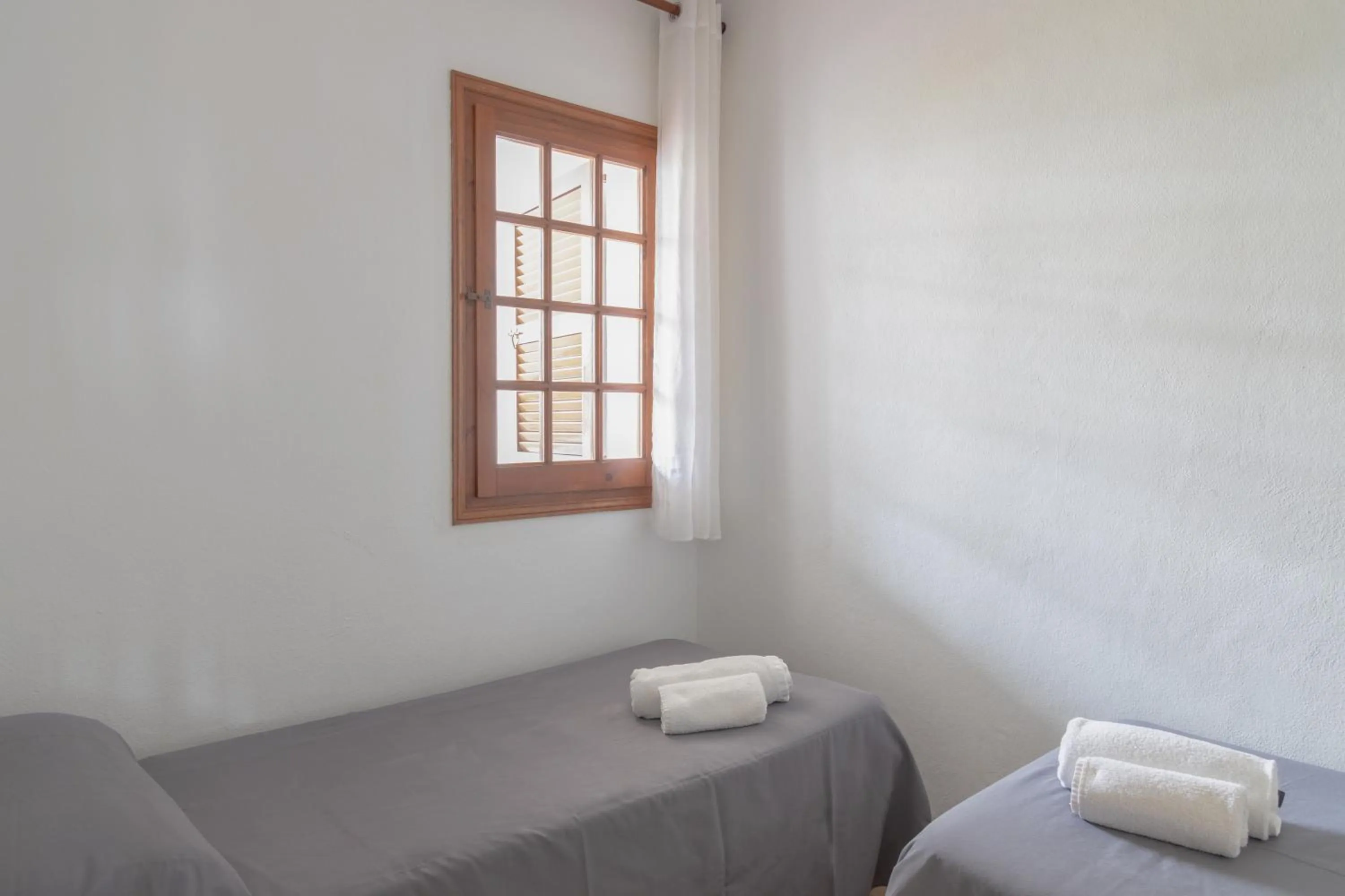 Bed in Apartamentos Son Bou Gardens By MENORCARENTALS
