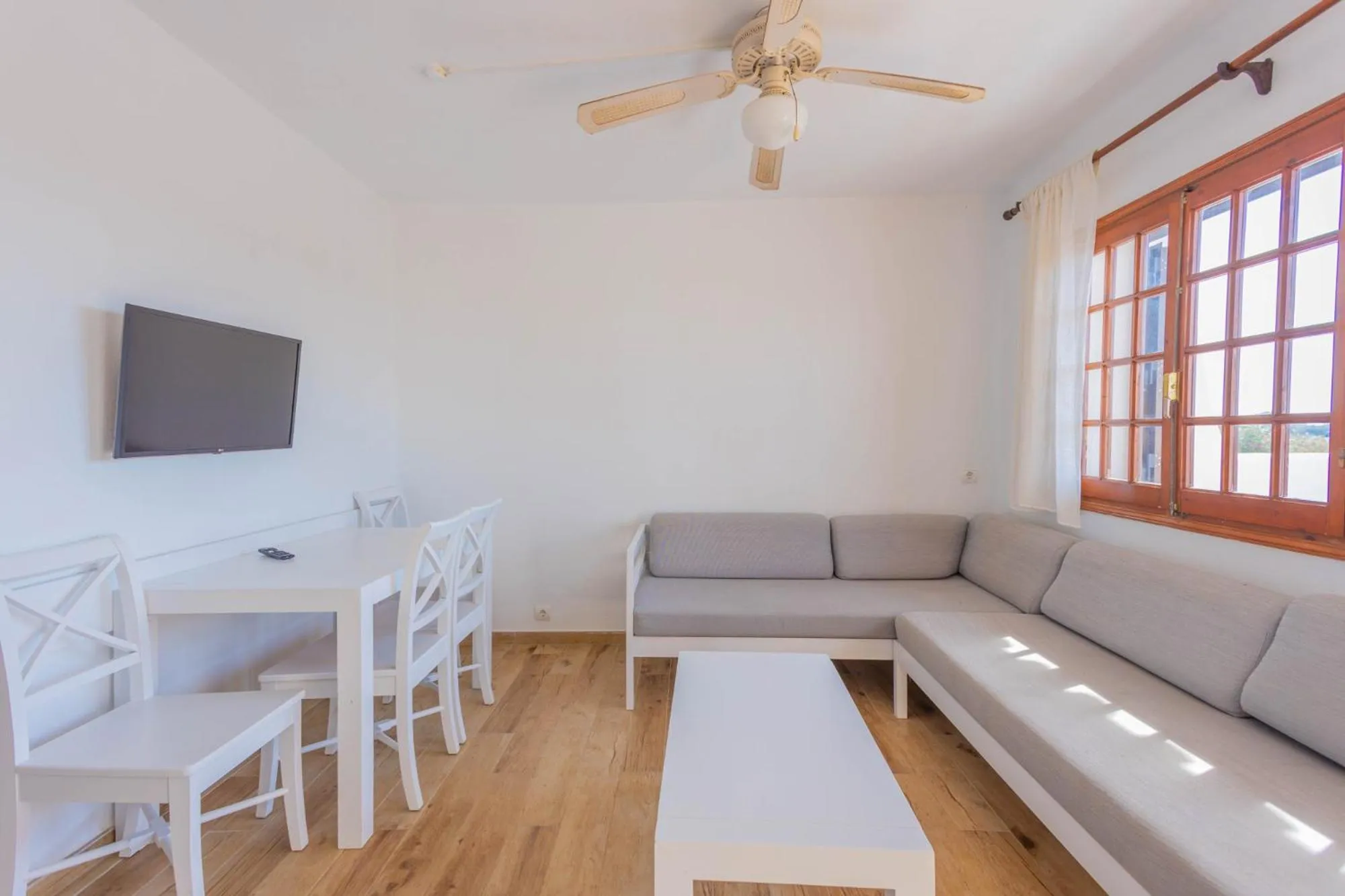 Living room in Apartamentos Son Bou Gardens By MENORCARENTALS