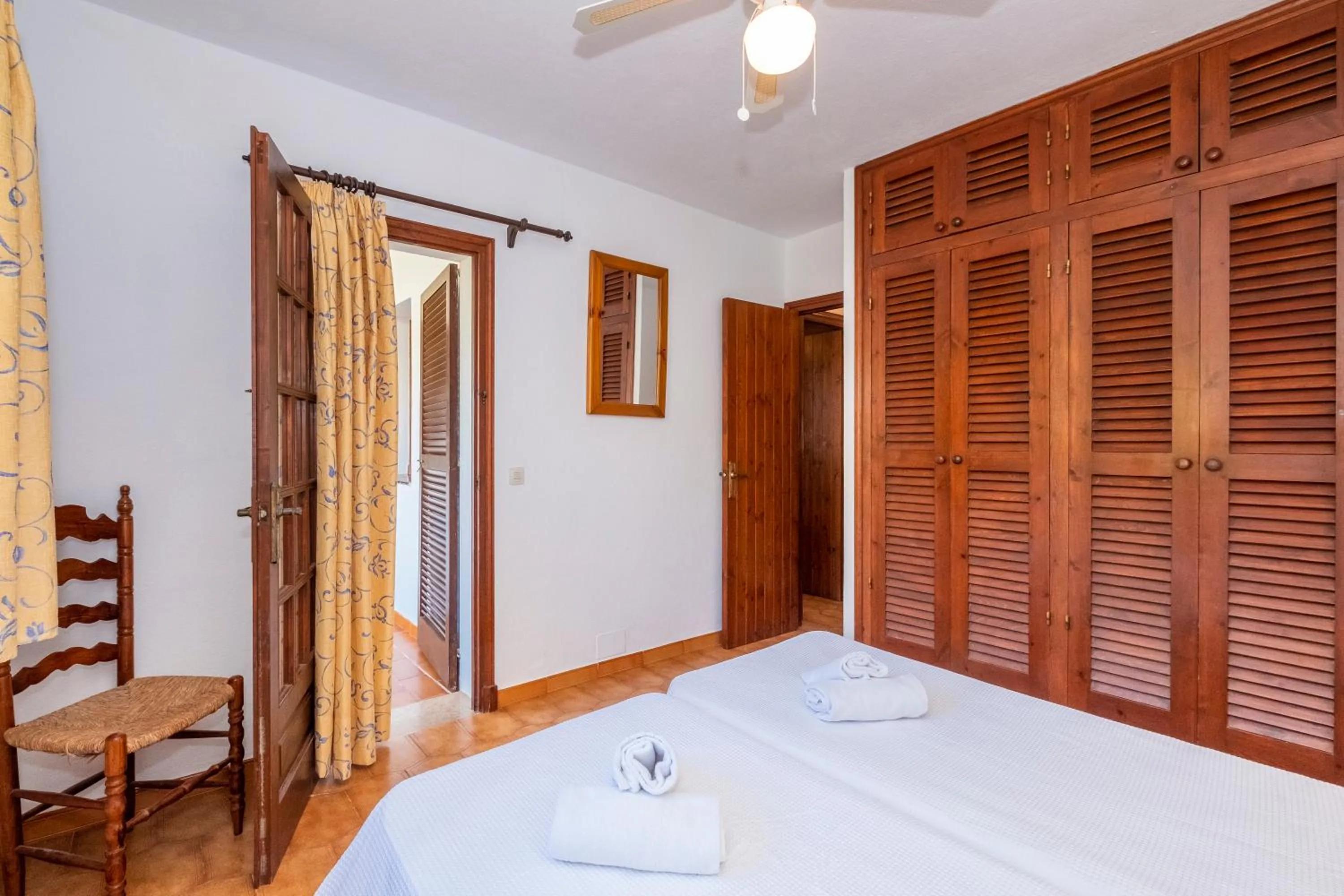 Bedroom, Bed in Apartamentos Son Bou Gardens By MENORCARENTALS
