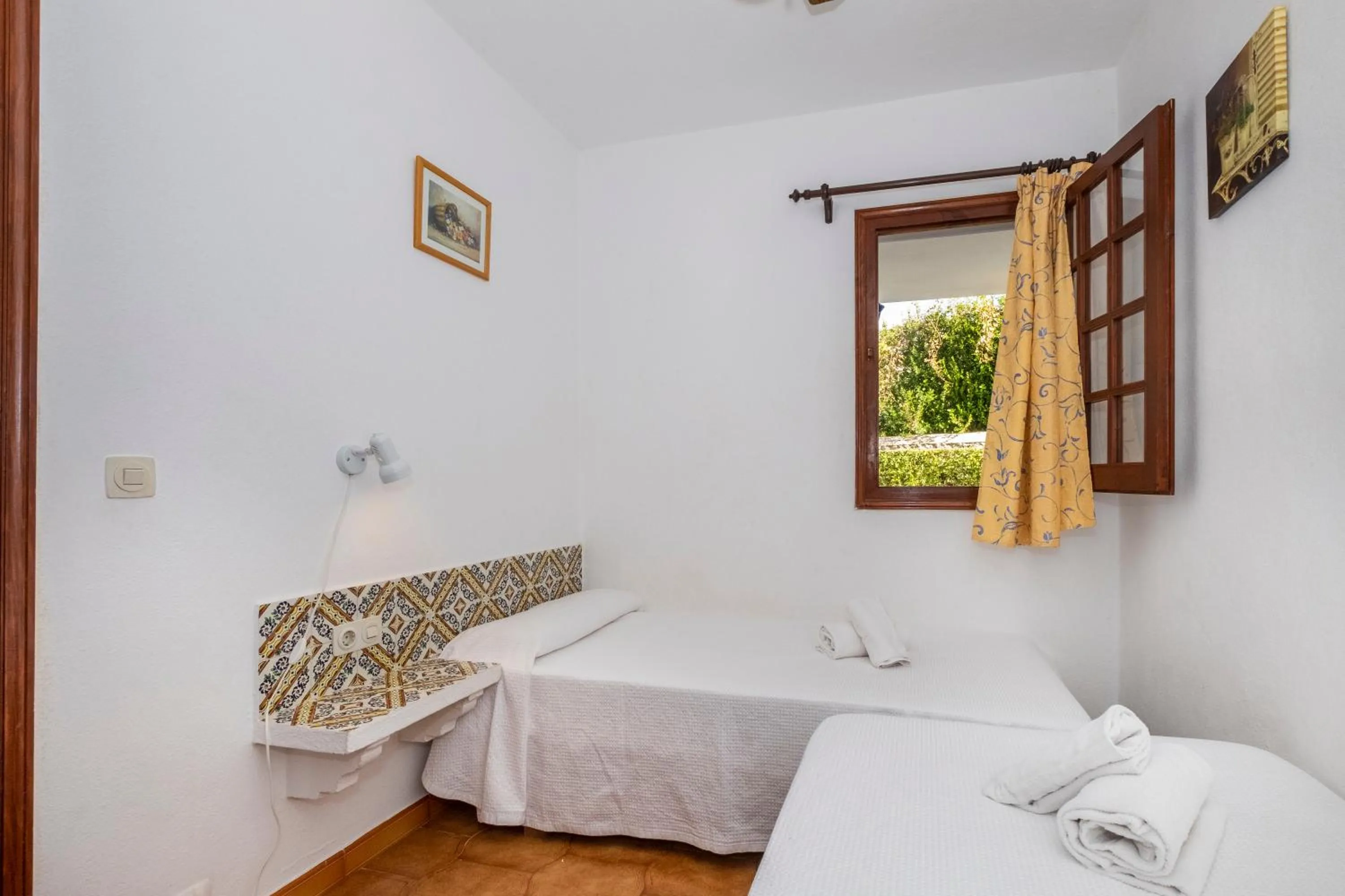 Bedroom, Bed in Apartamentos Son Bou Gardens By MENORCARENTALS