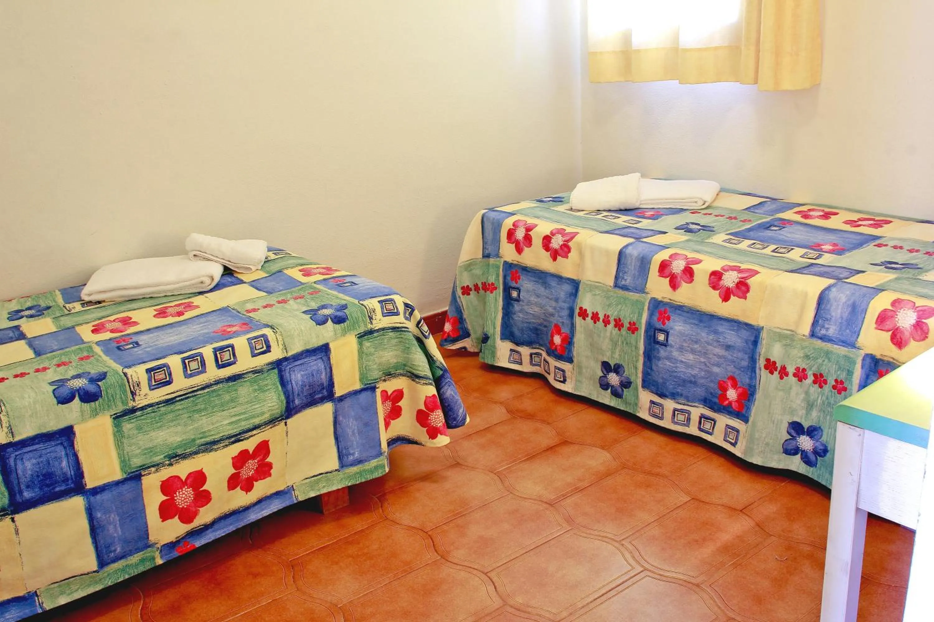Bedroom, Bed in Apartamentos Son Bou Gardens By MENORCARENTALS