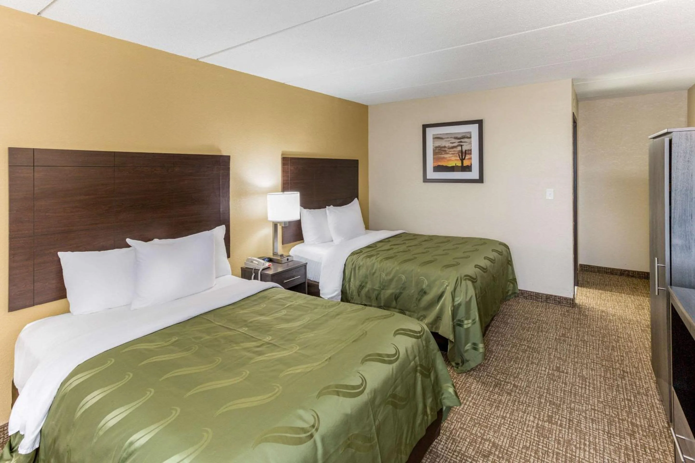 Bed in Quality Inn & Suites Plattsburgh
