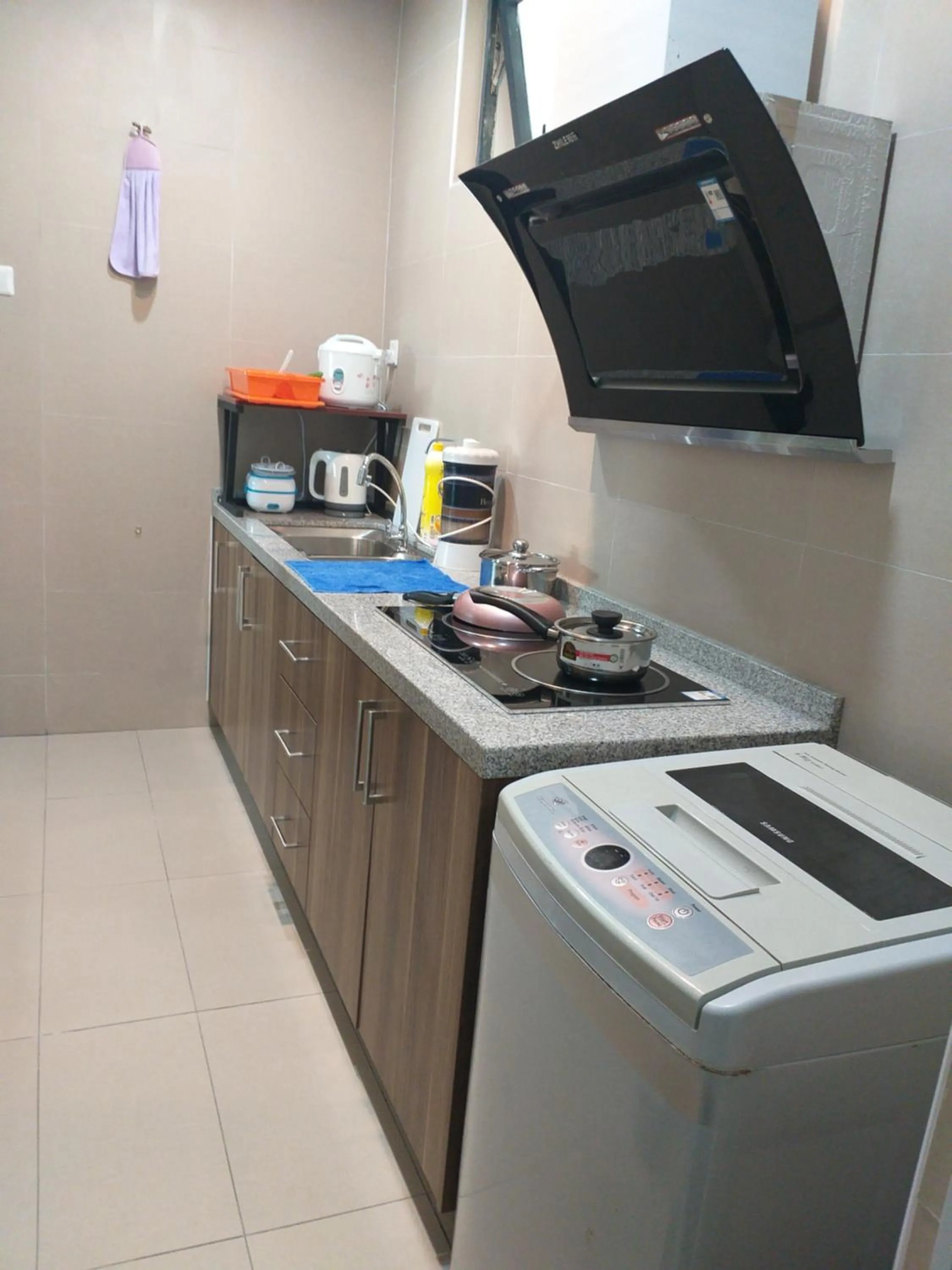 Kitchen or kitchenette in Kempas Indah @ The Secret Garden Homestay