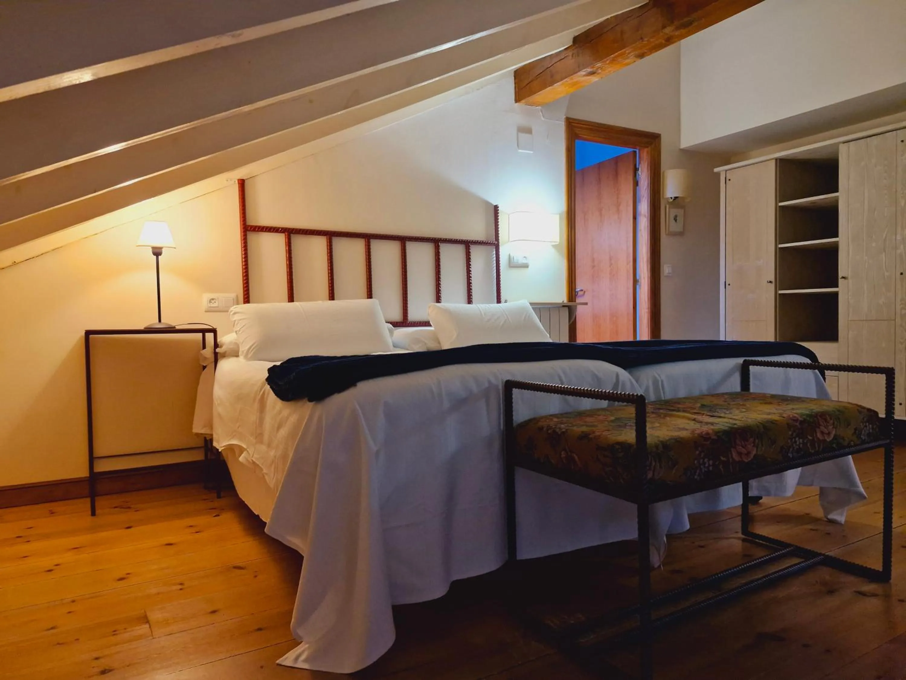 Photo of the whole room, Bed in Hospederia Santillana