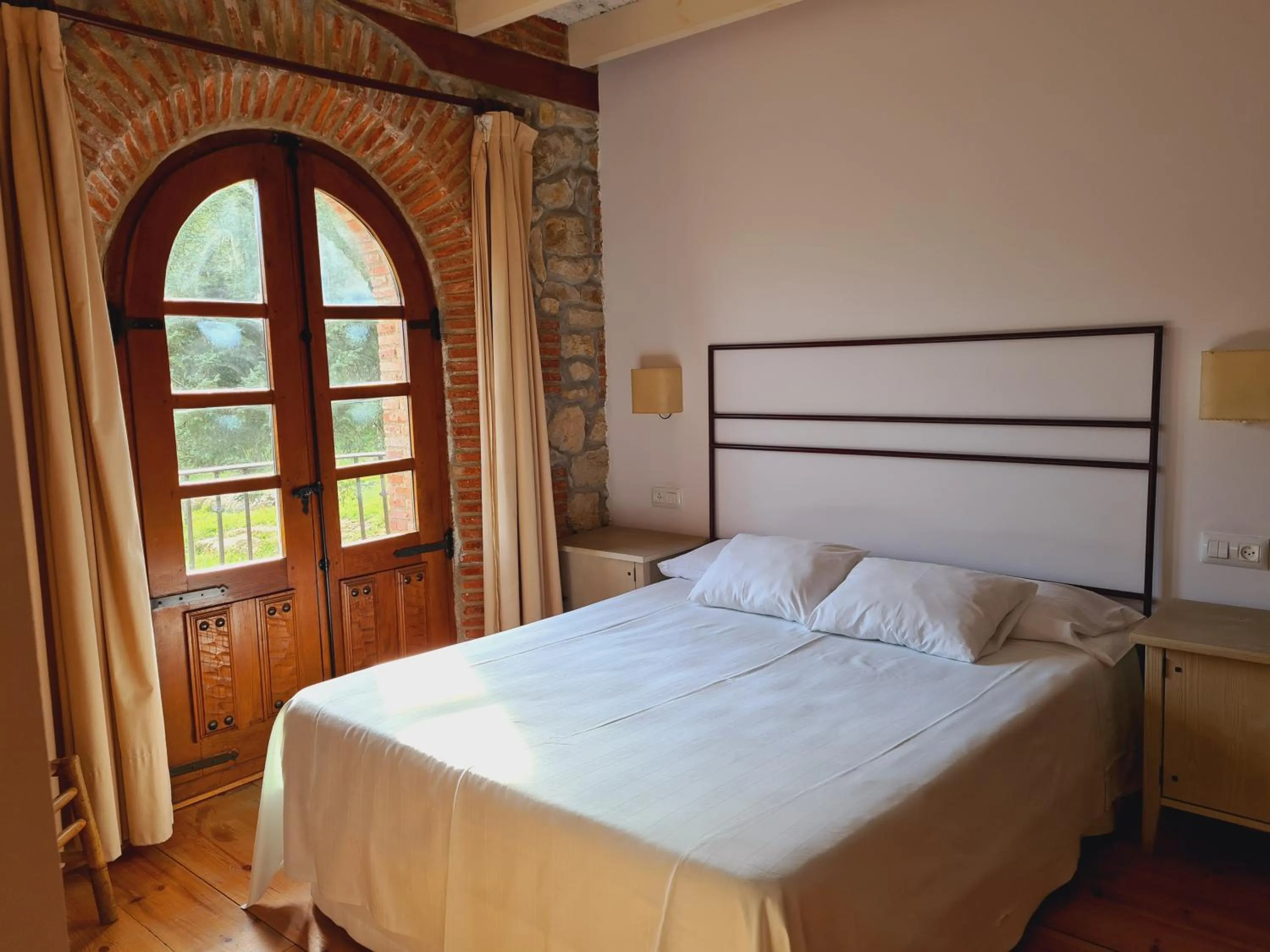 Photo of the whole room, Bed in Hospederia Santillana