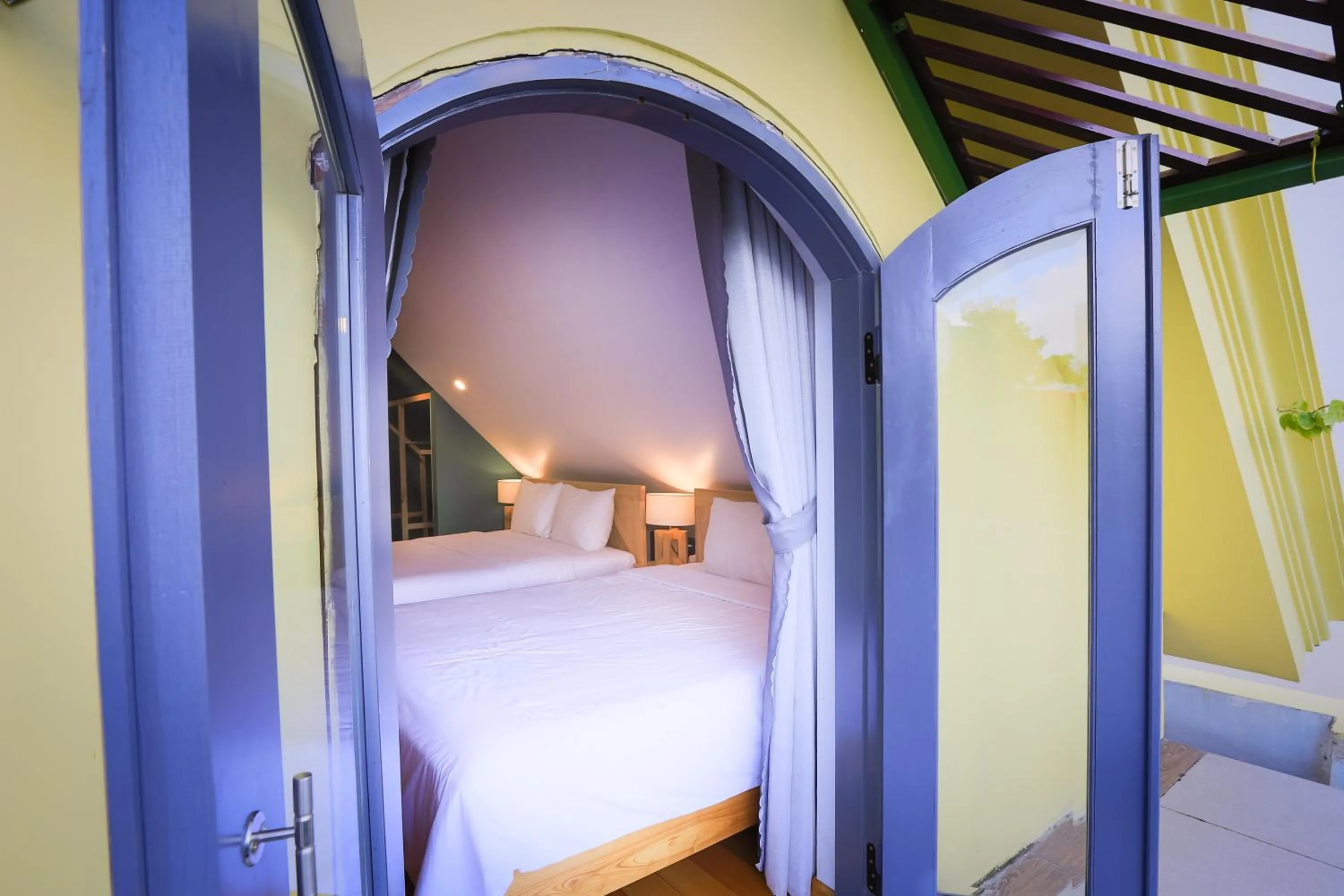 Bed in Thi Boutique Villa