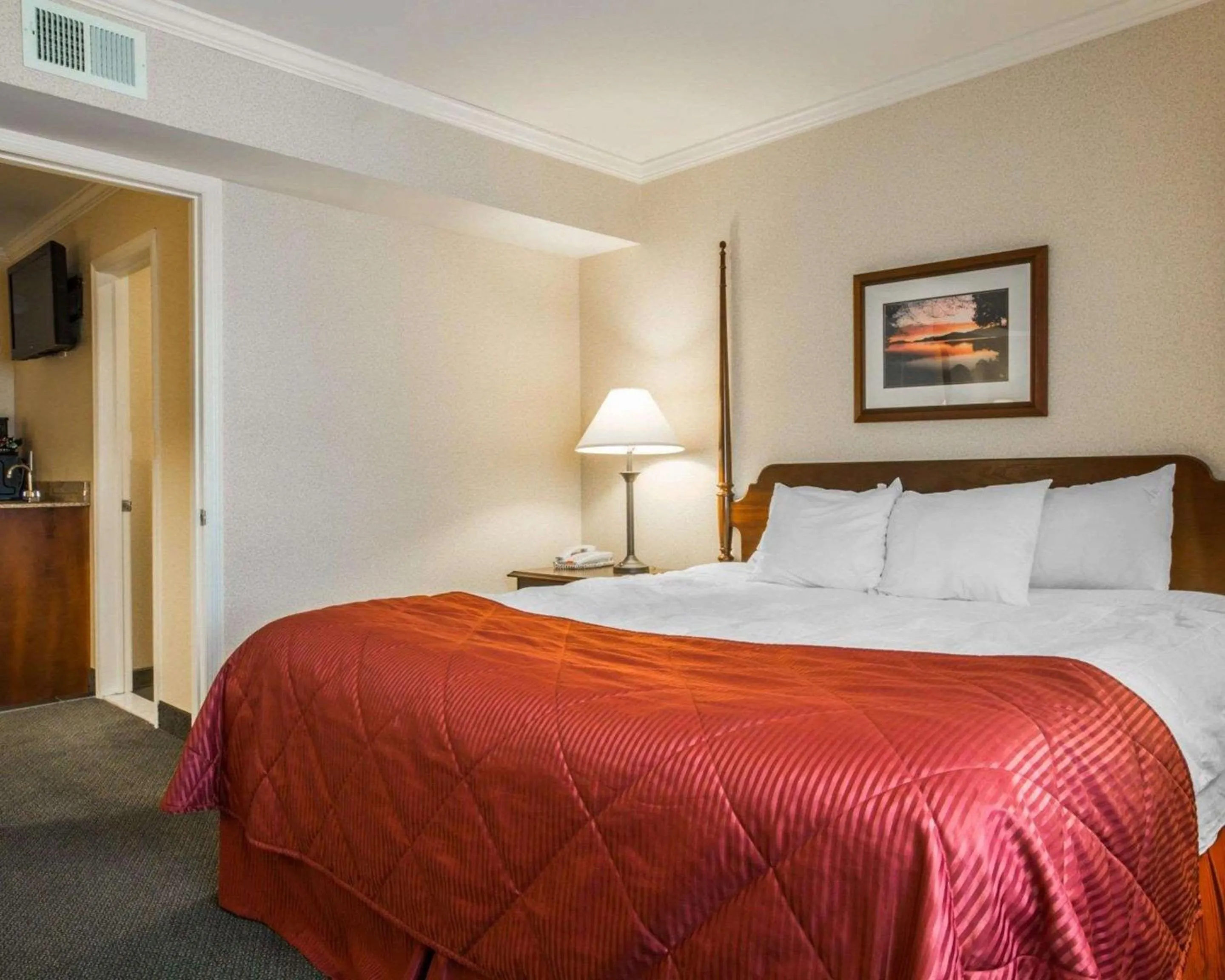 Bedroom, Bed in Clarion Inn & Suites at the Outlets of Lake George