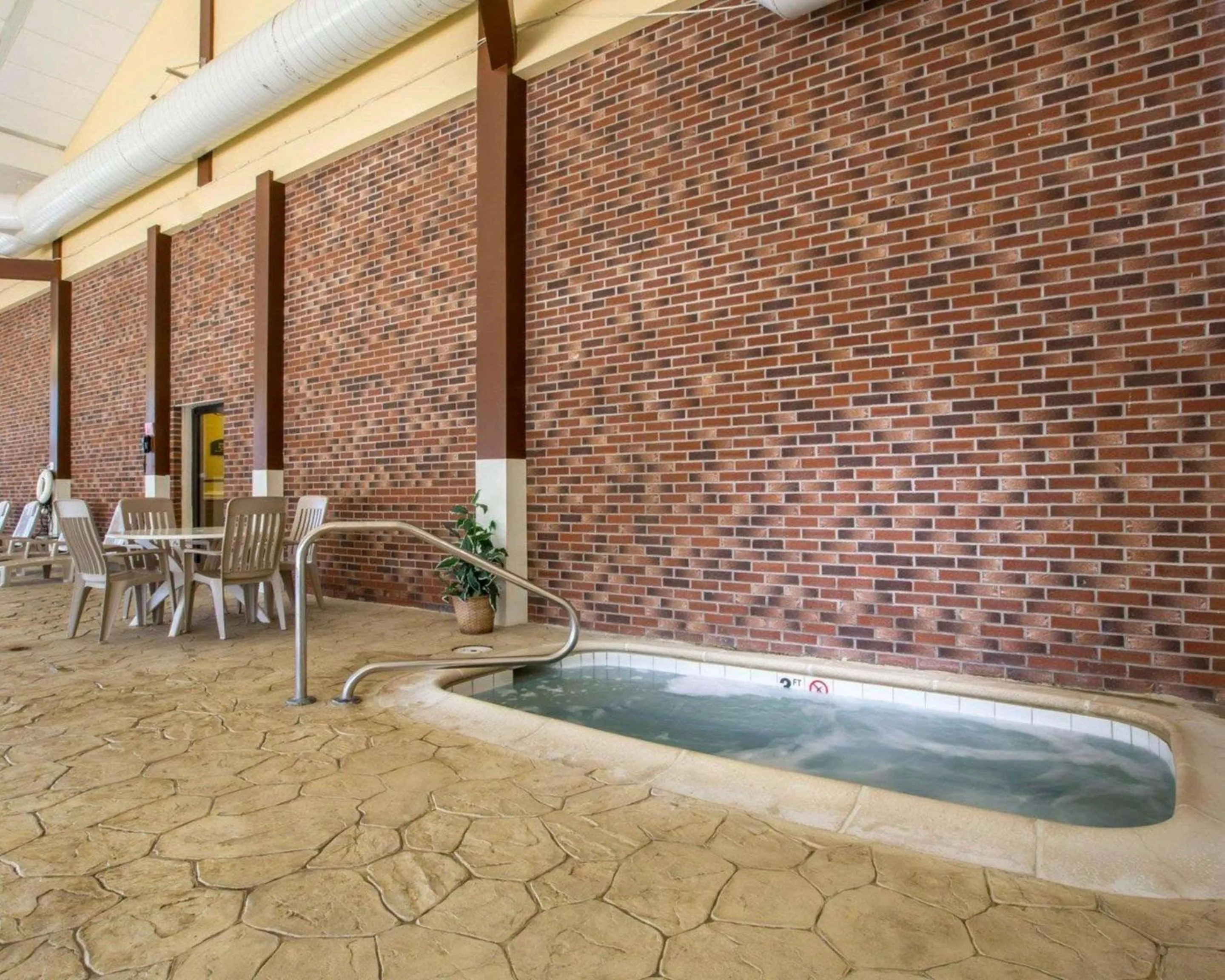 Swimming pool in Clarion Inn & Suites at the Outlets of Lake George