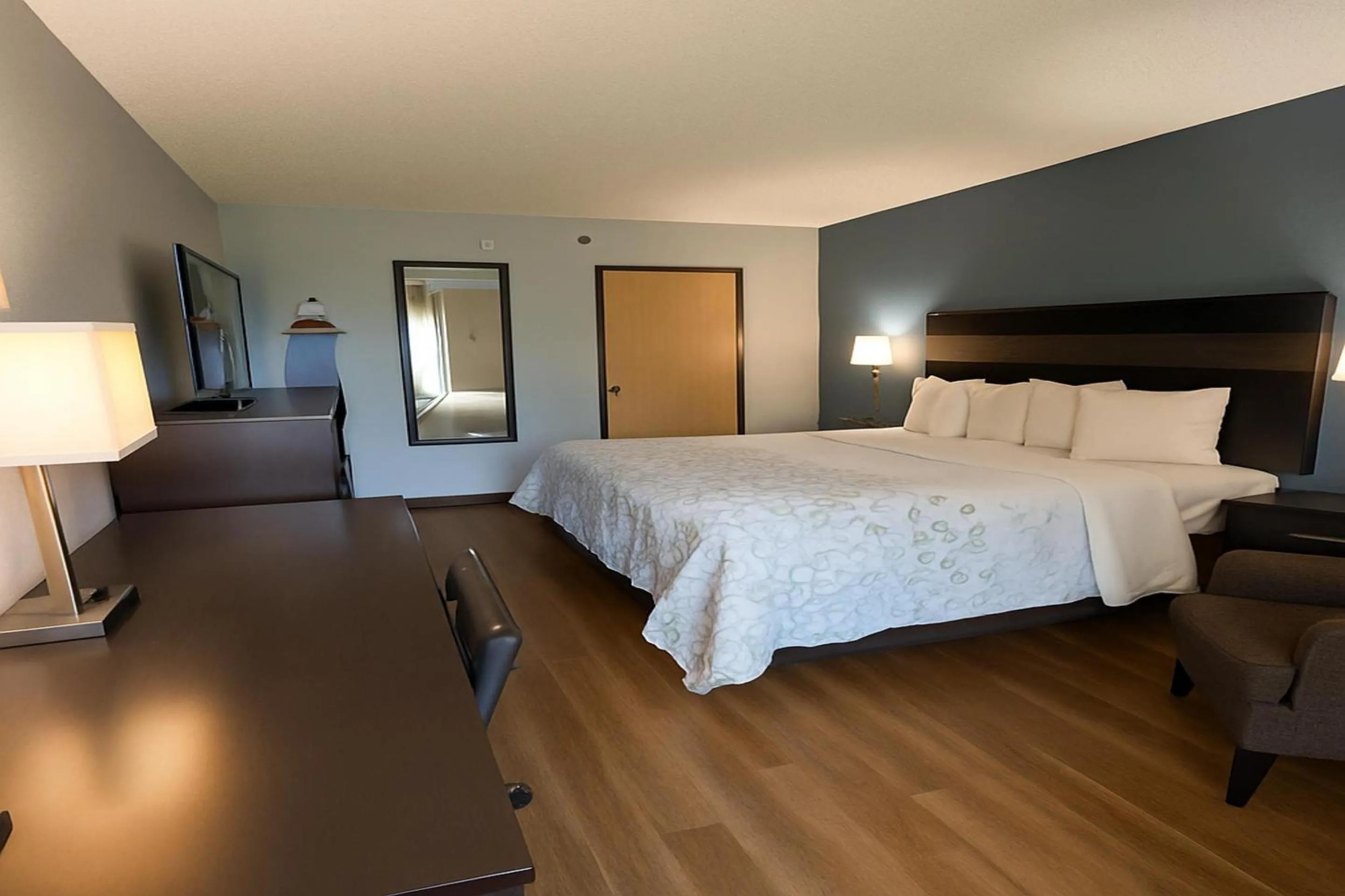 Bedroom, Bed in HomeTown Inn by Red Roof East Syracuse