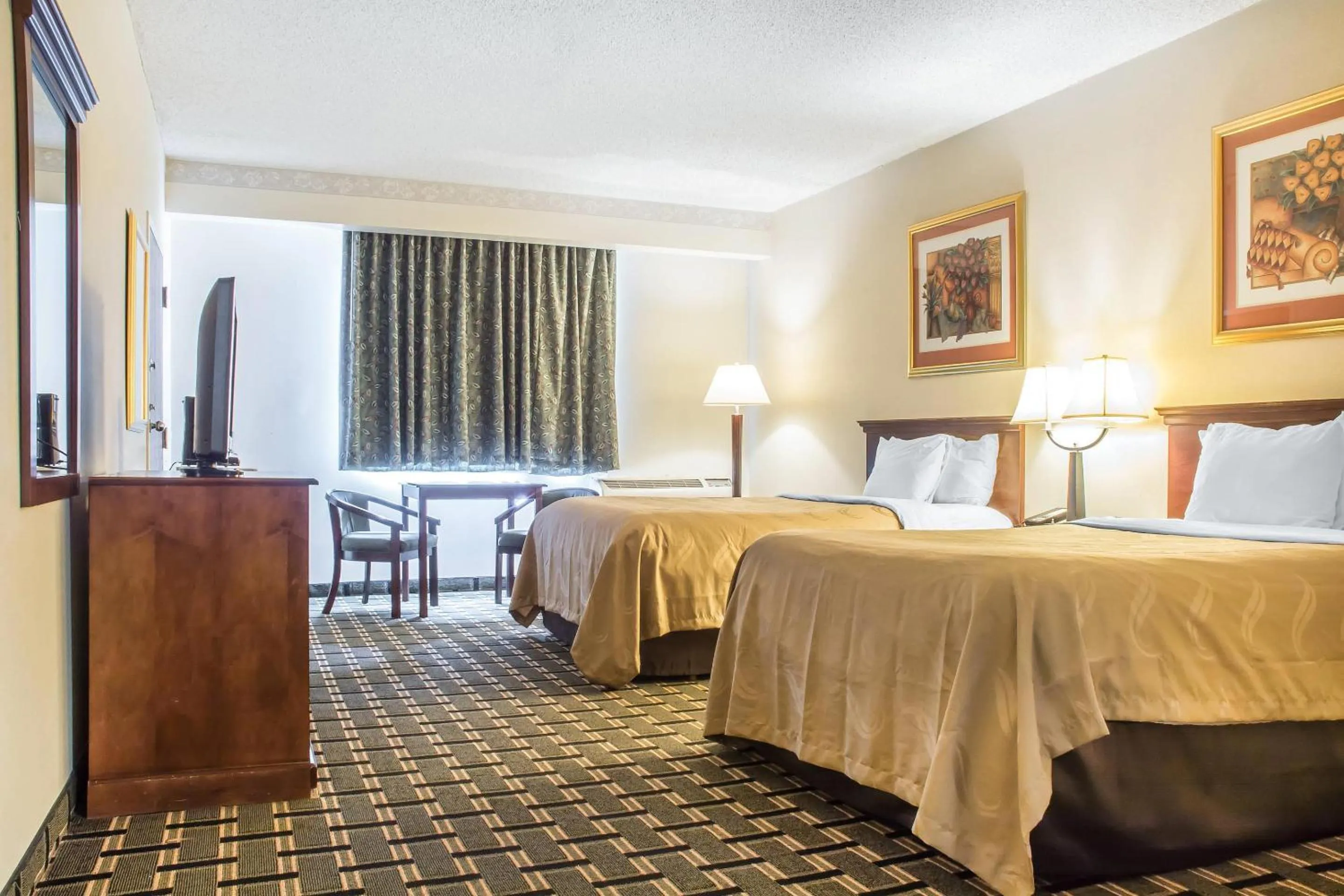 Bedroom, Bed in Quality Inn & Suites Palm Island Indoor Waterpark