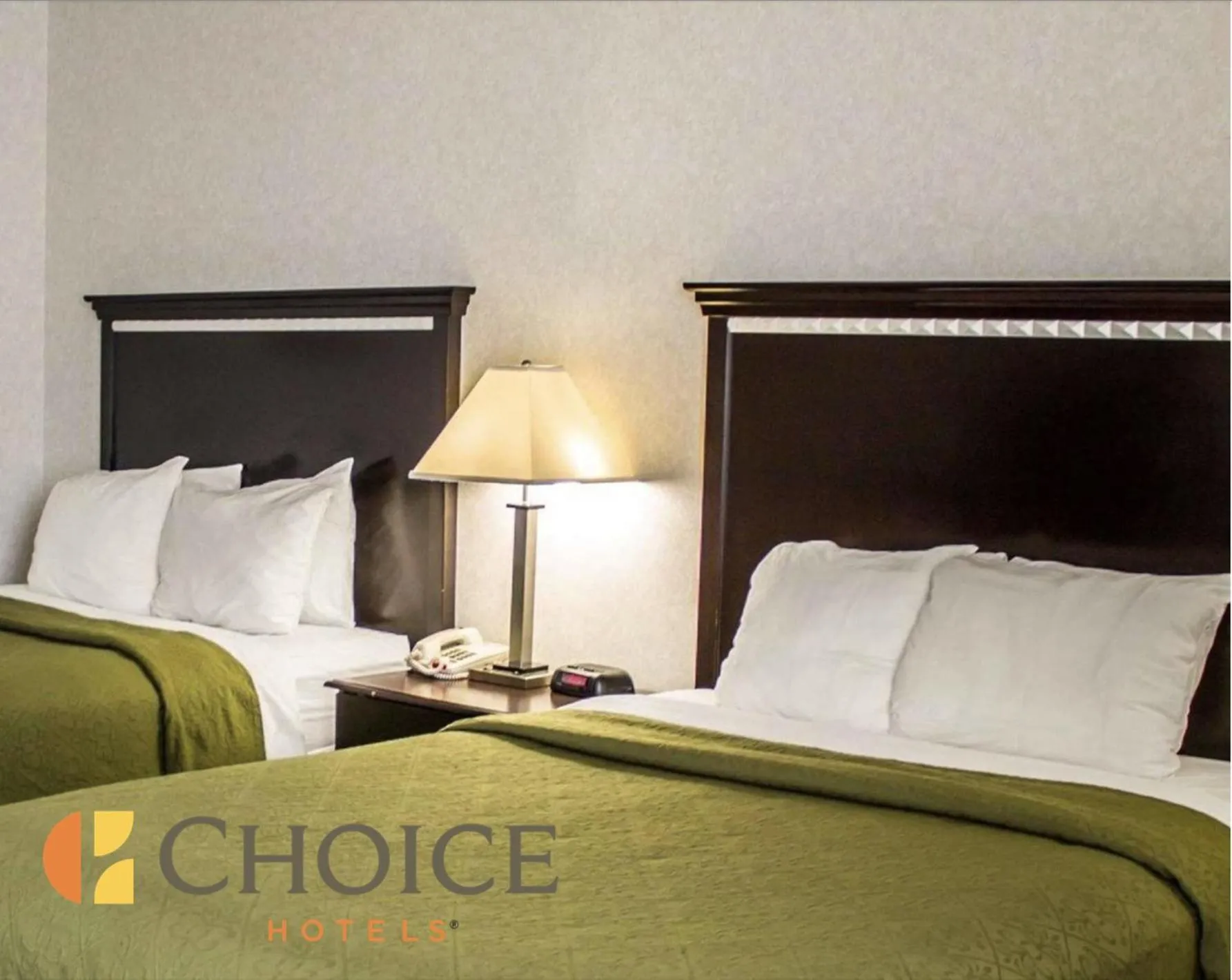 Bed in Quality Inn & Suites Mansfield