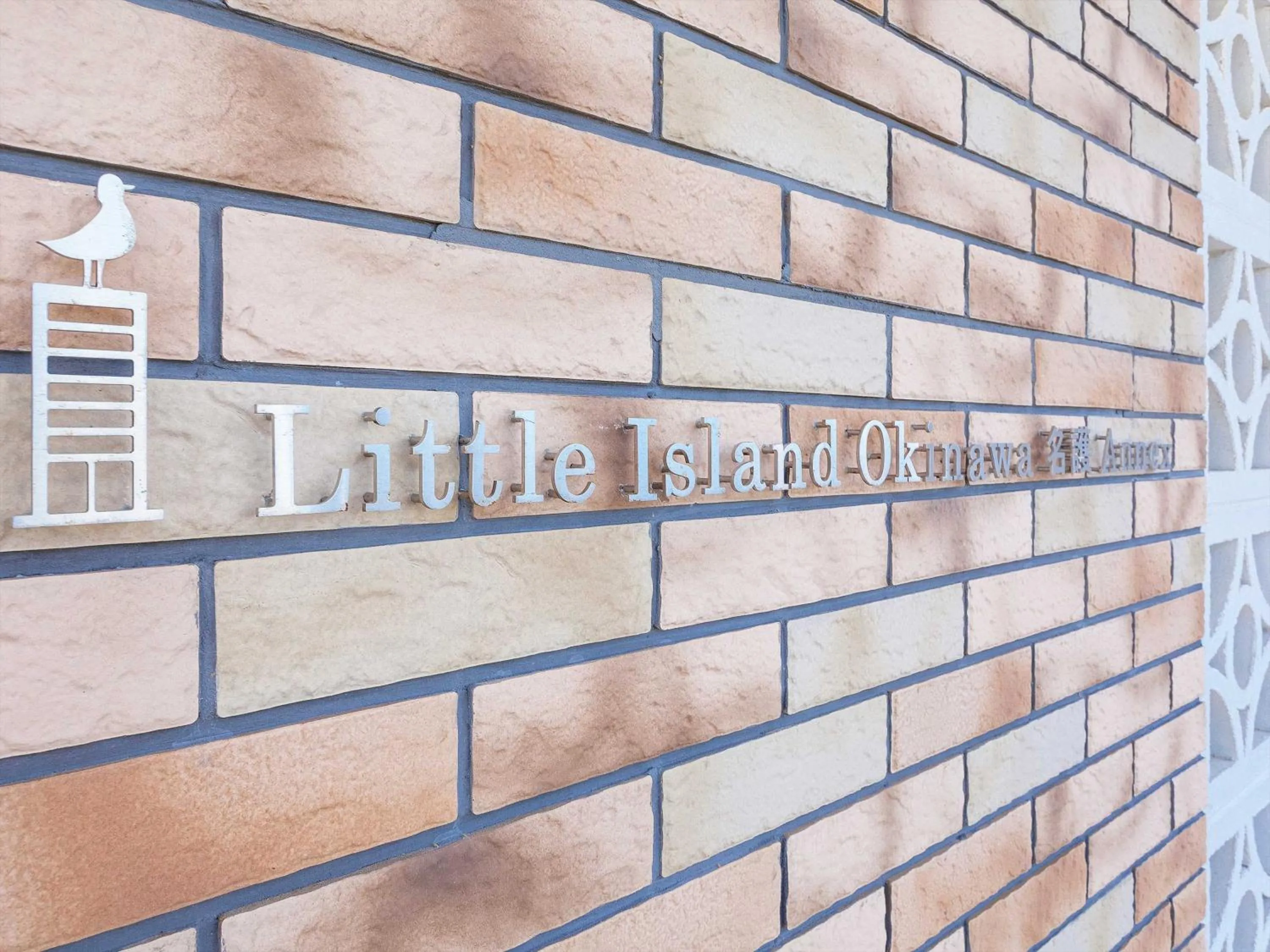 Property logo or sign in Little Island Okinawa Nago