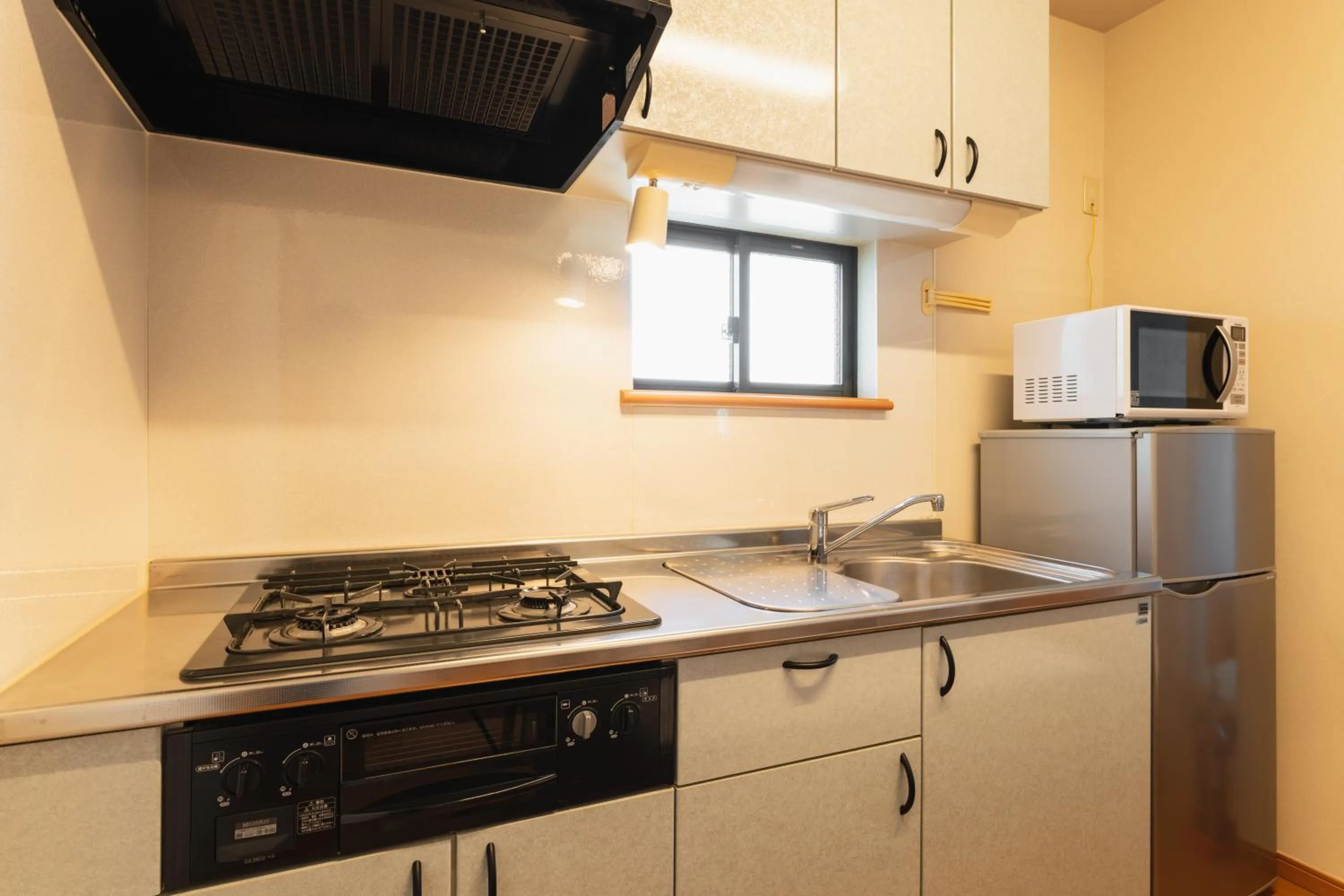 Kitchen or kitchenette in Ecol Beppu