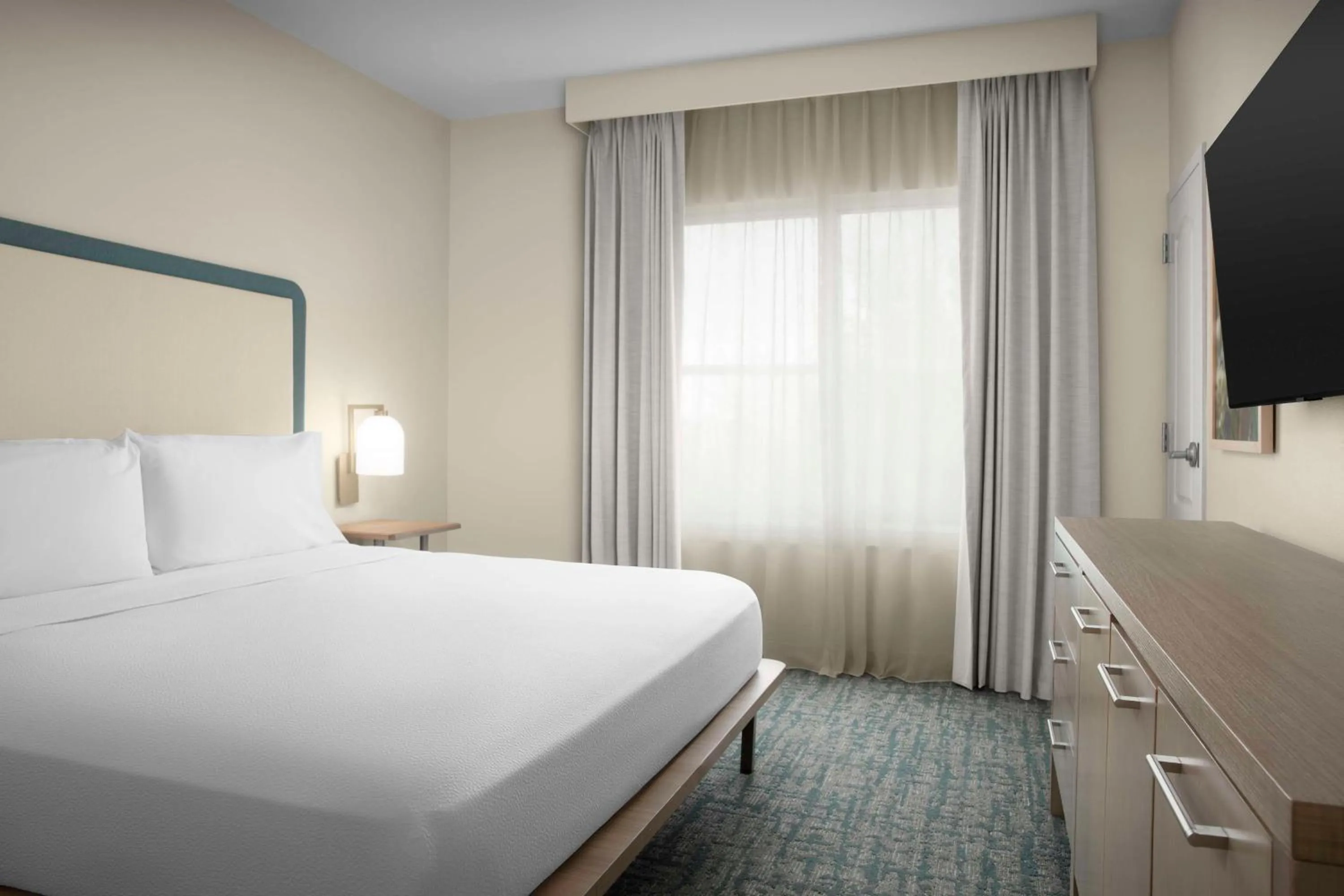 Bed in Homewood Suites by Hilton Irving-DFW Airport