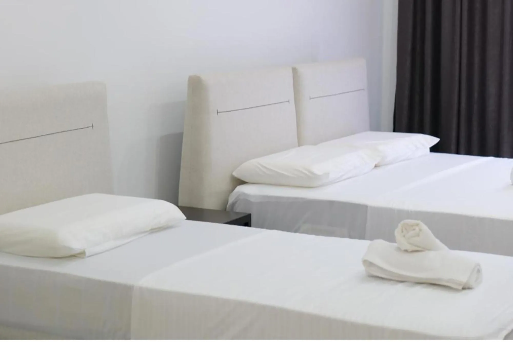 Bed in Lux Apartments