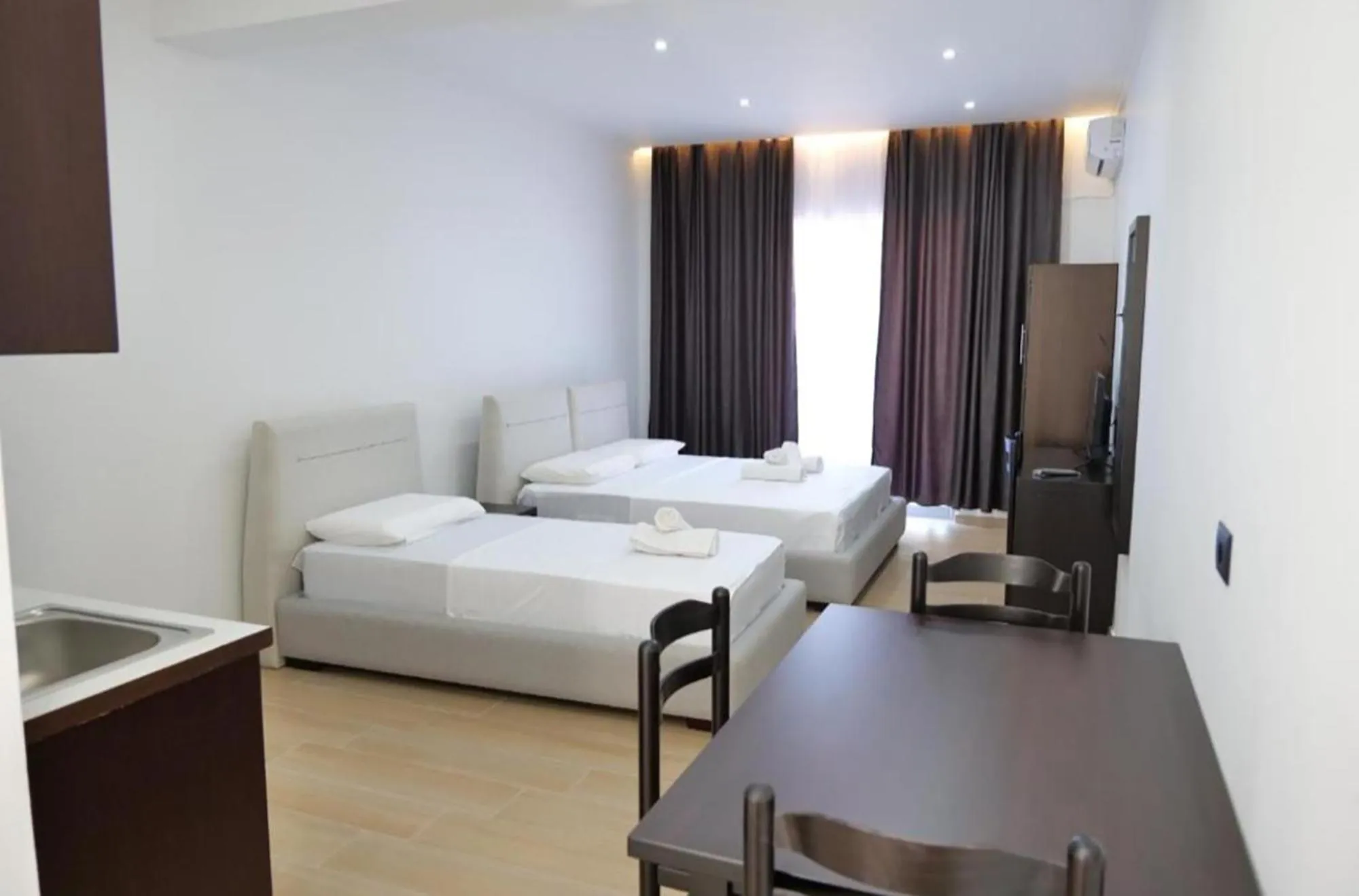 Bed in Lux Apartments