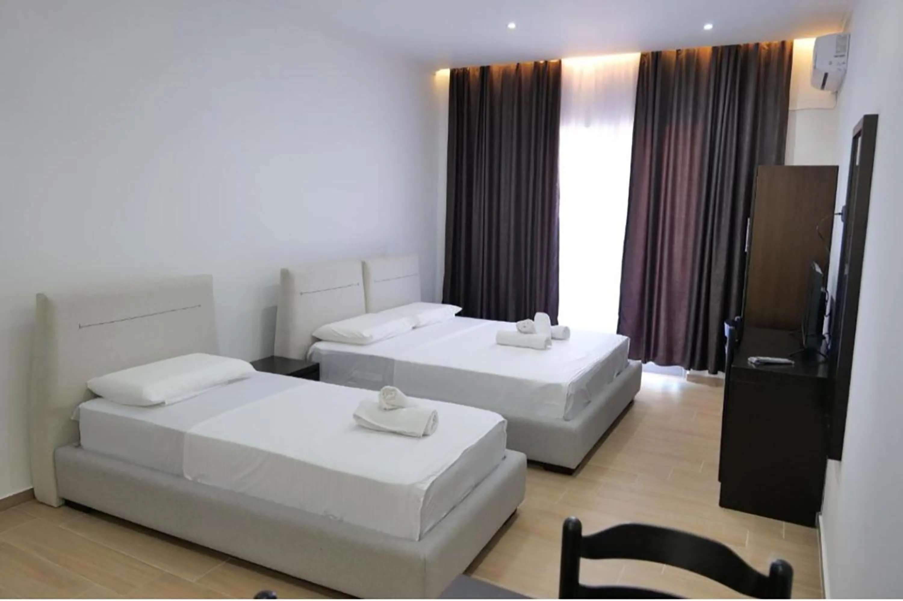 Bed in Lux Apartments