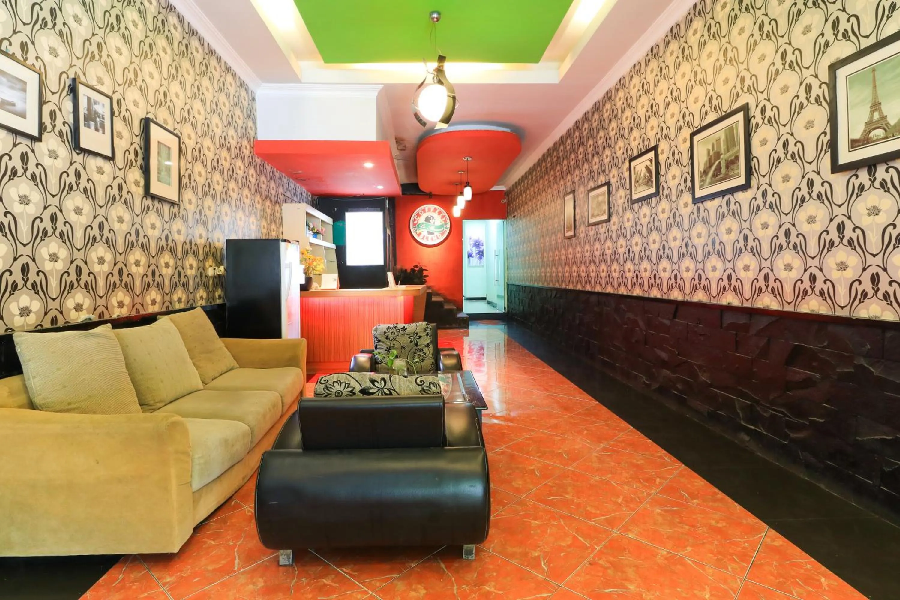 Seating area in Labuana Homestay and Cafe Garden Makassar