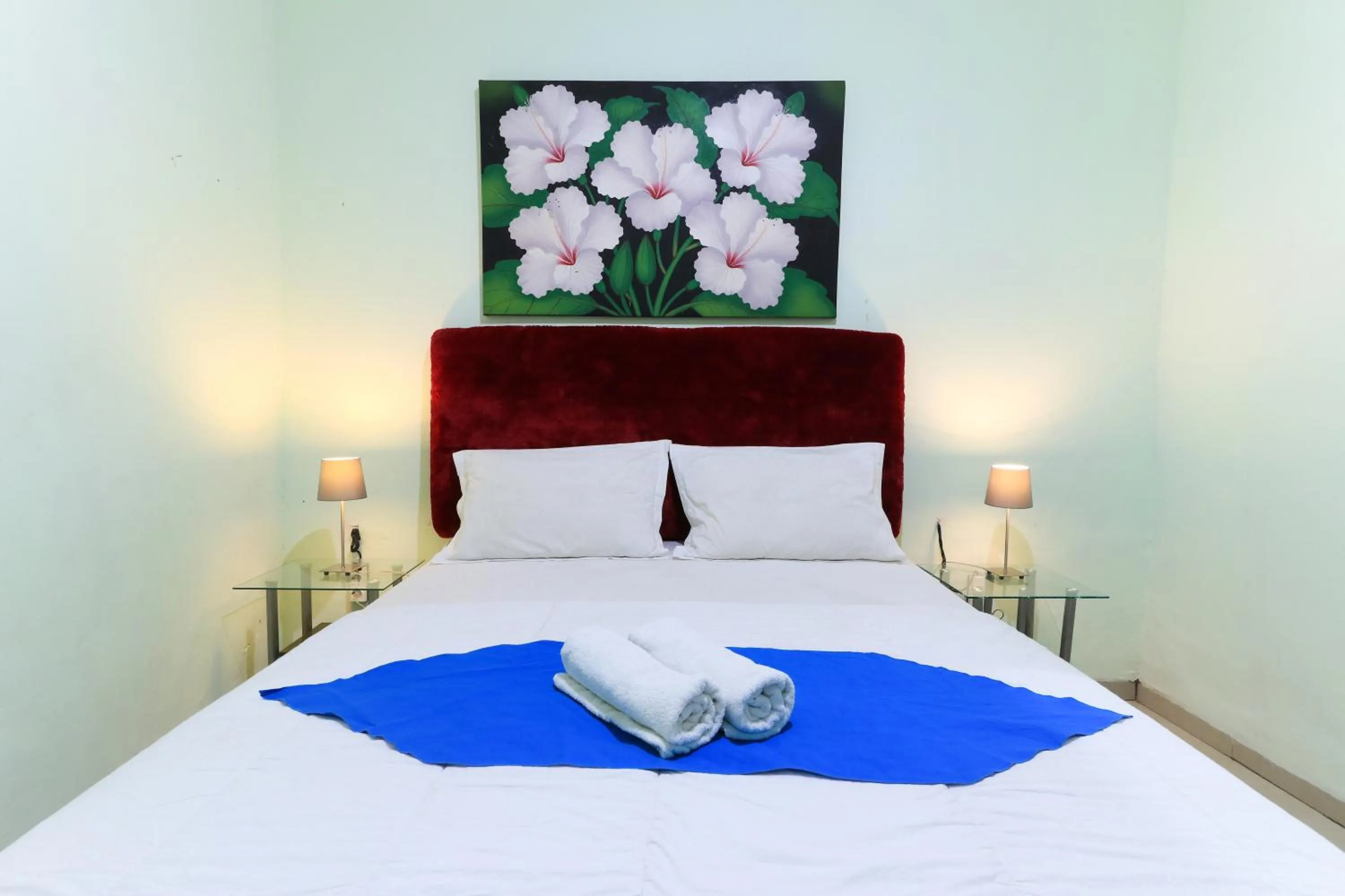 Bed in Labuana Homestay and Cafe Garden Makassar