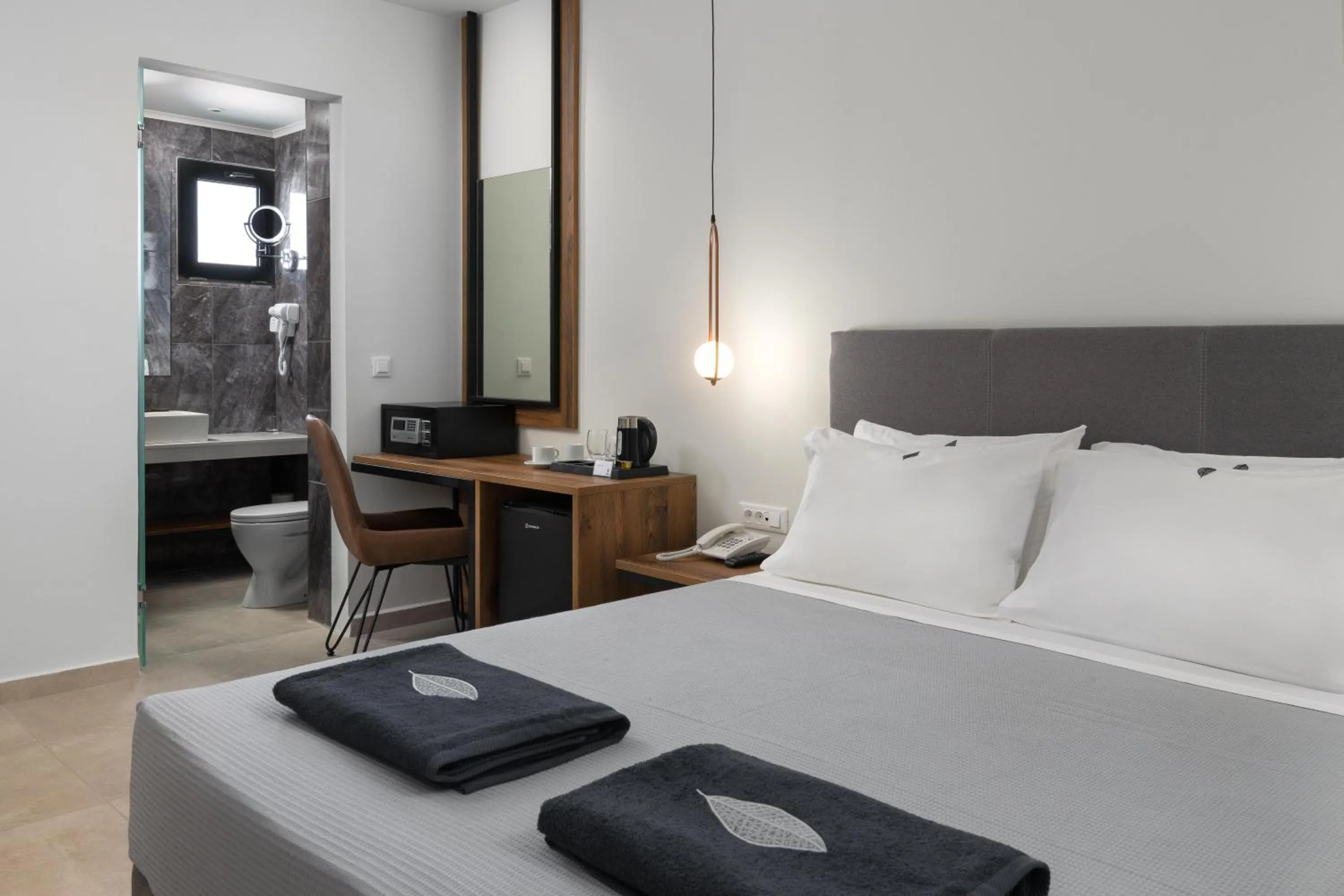 Bed in Atalanti Boutique Hotel - Adults Only