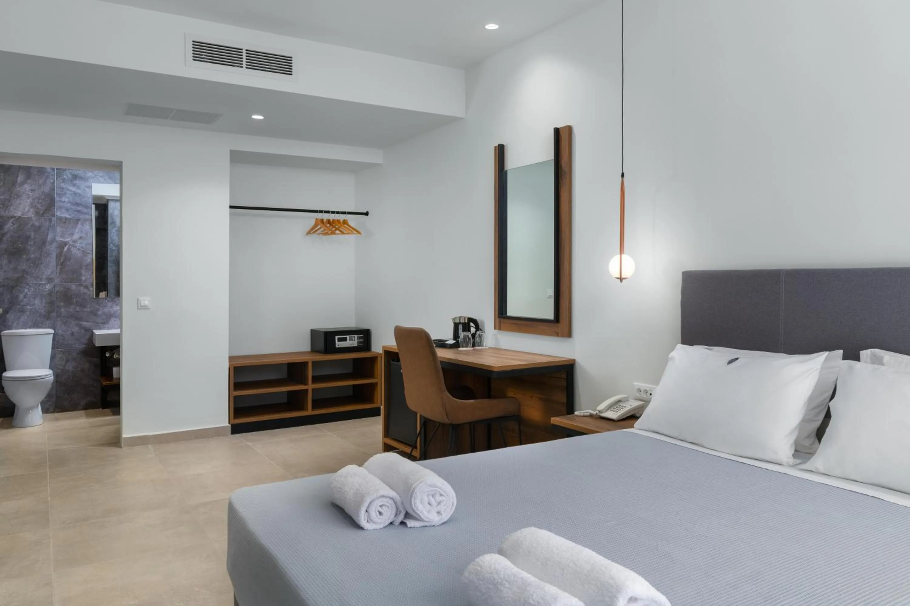 Photo of the whole room, Bed in Atalanti Boutique Hotel - Adults Only