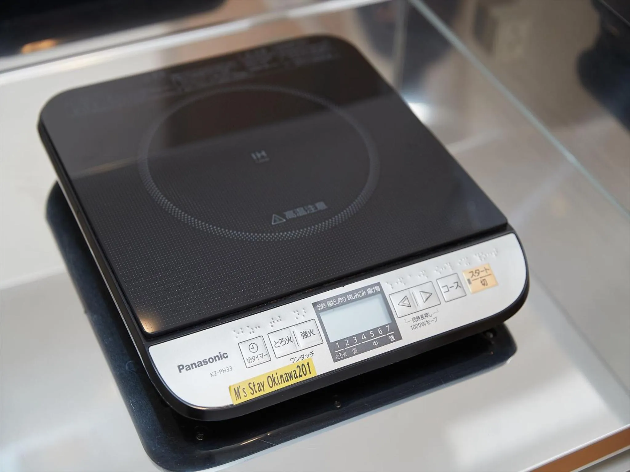 Kitchen or kitchenette in M´s Stay Okinawa