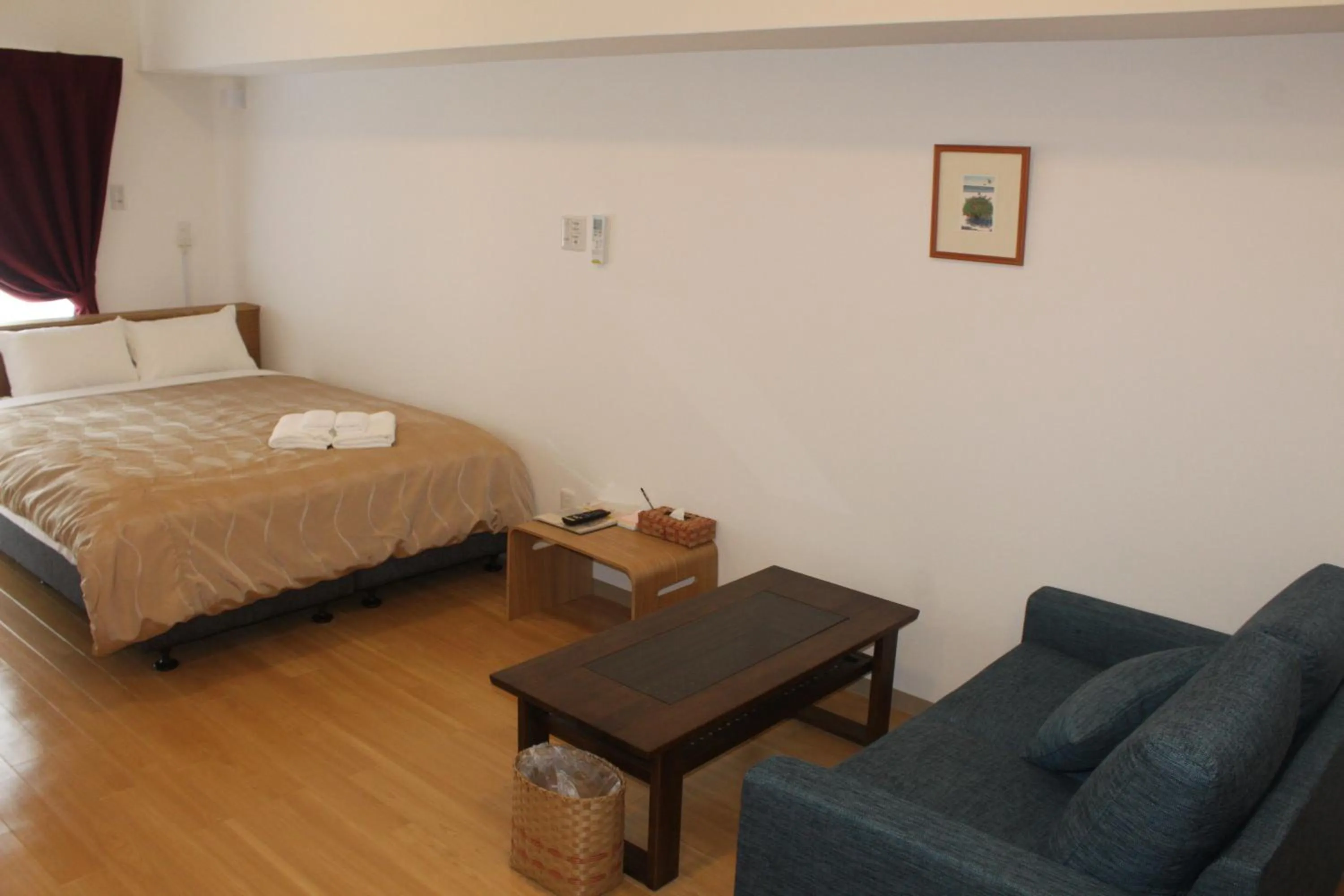 Photo of the whole room, Bed in M´s Stay Okinawa