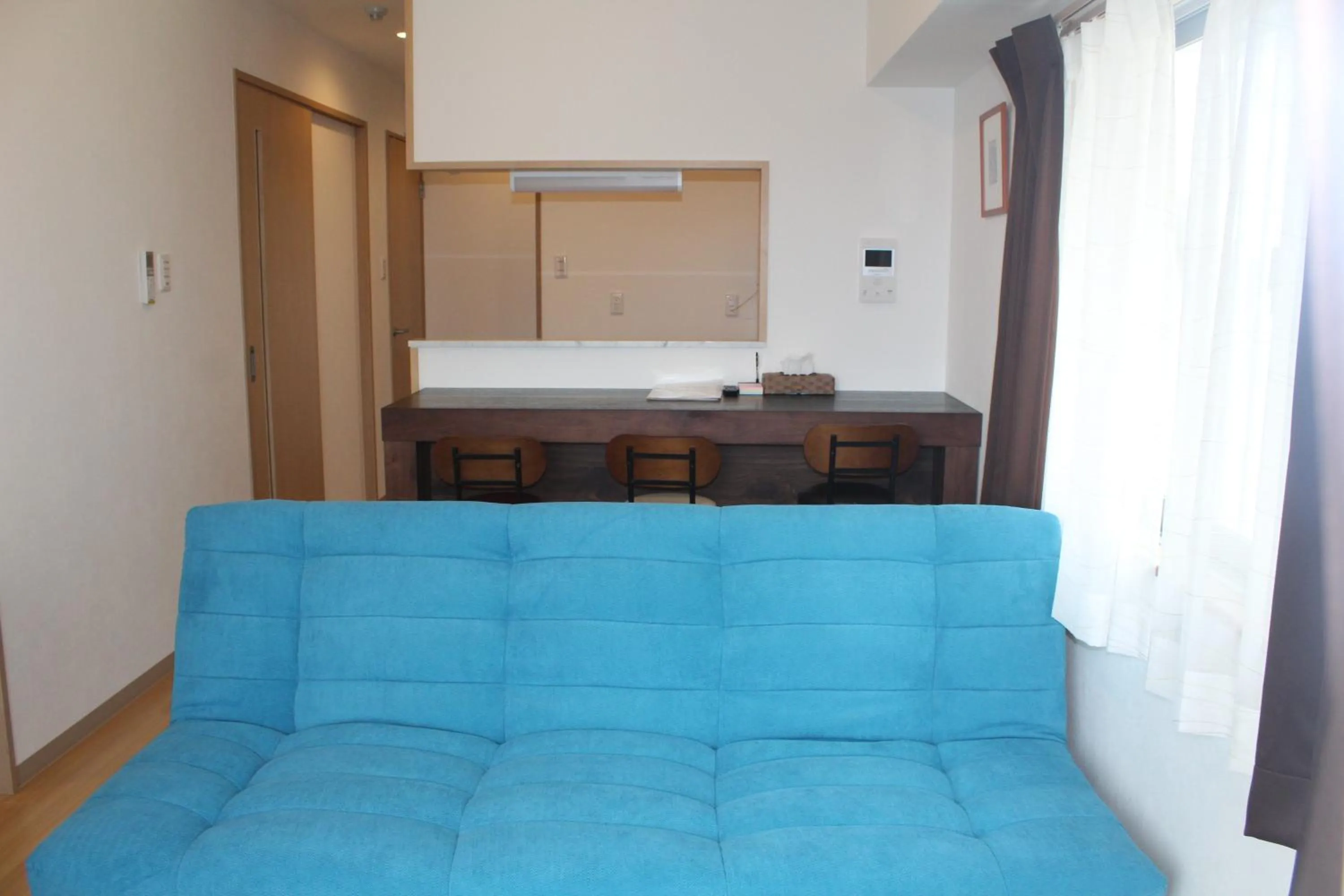 Living room in M´s Stay Okinawa