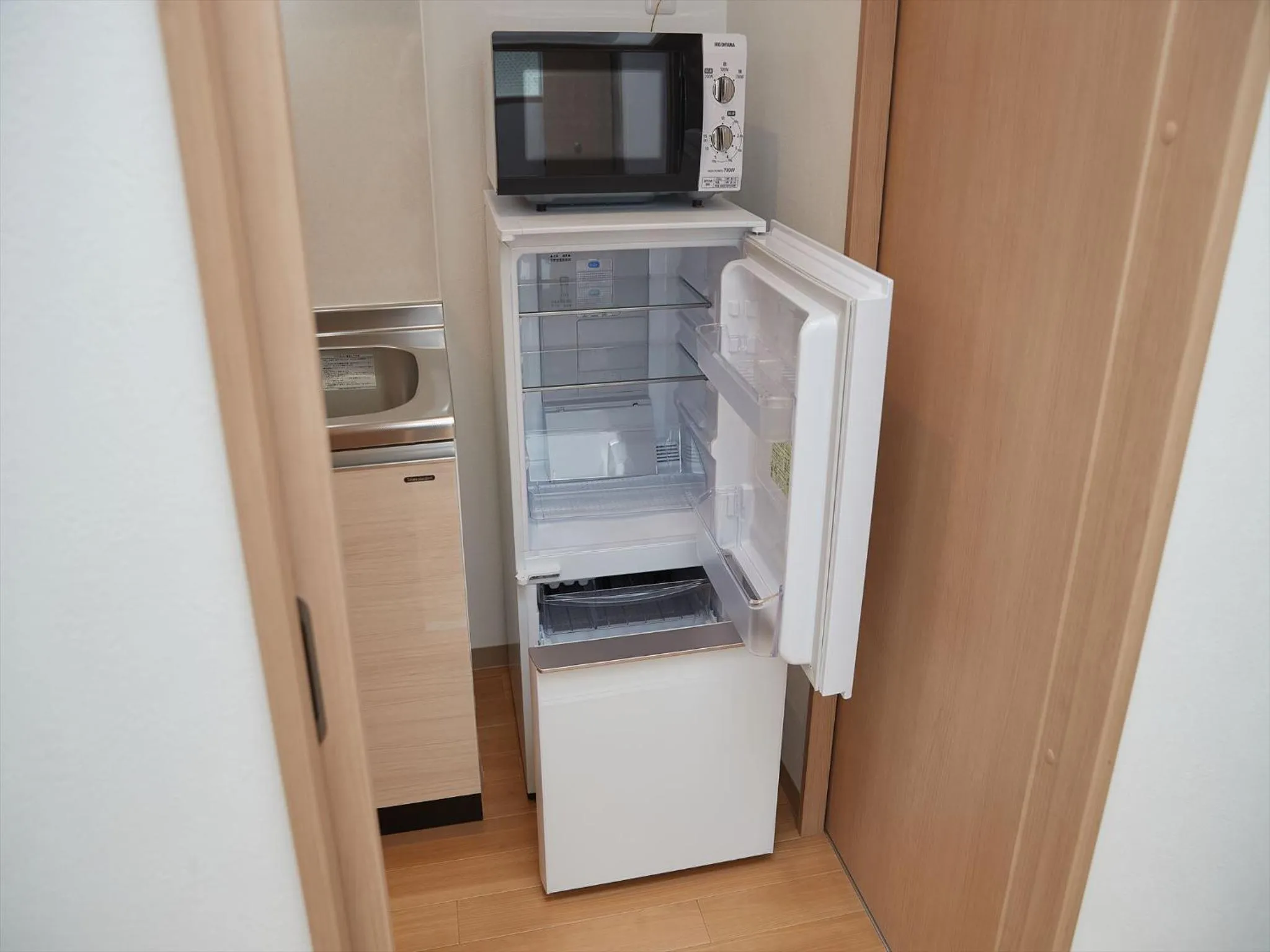 Kitchen or kitchenette in M´s Stay Okinawa