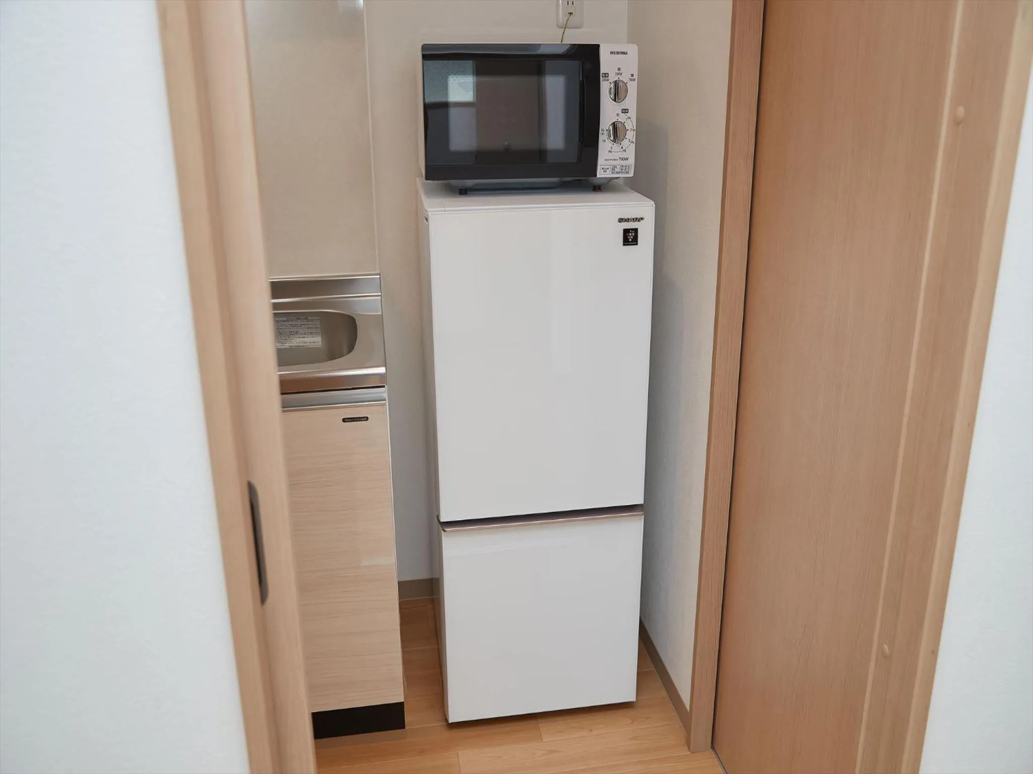 Kitchen or kitchenette in M´s Stay Okinawa
