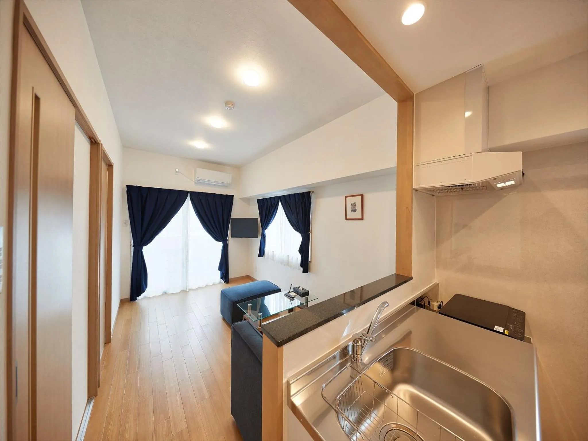 Kitchen or kitchenette in M´s Stay Okinawa